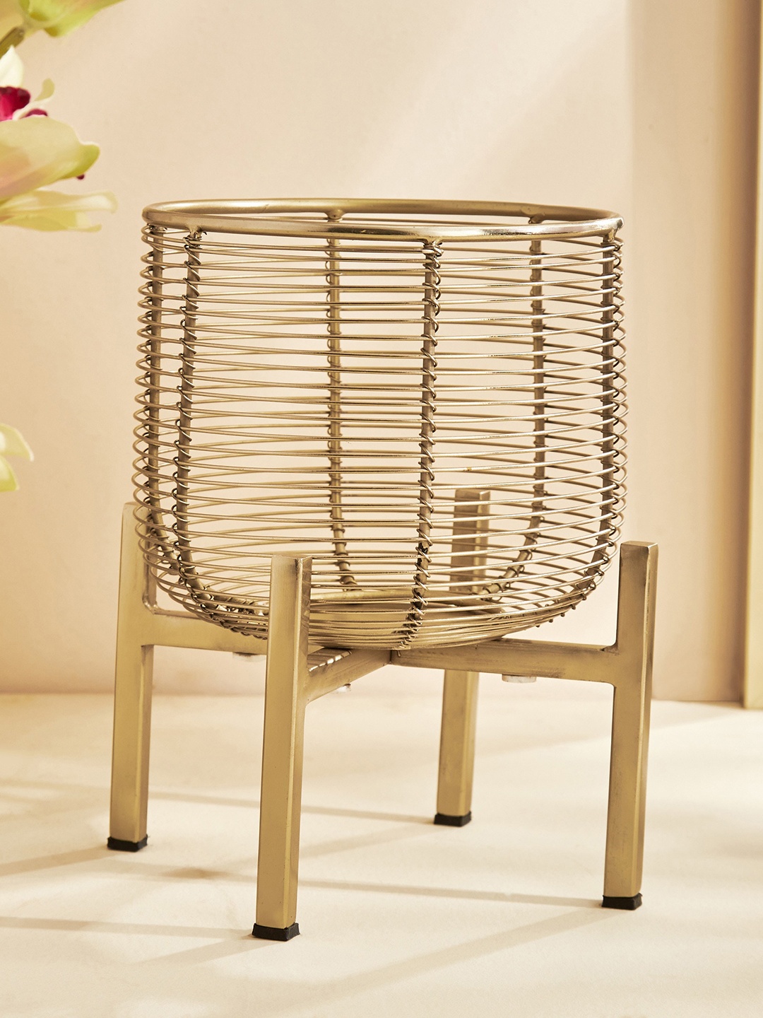 

Home Centre Splendid Megas Gold Toned Iron Wired Hurricane Candle Holder