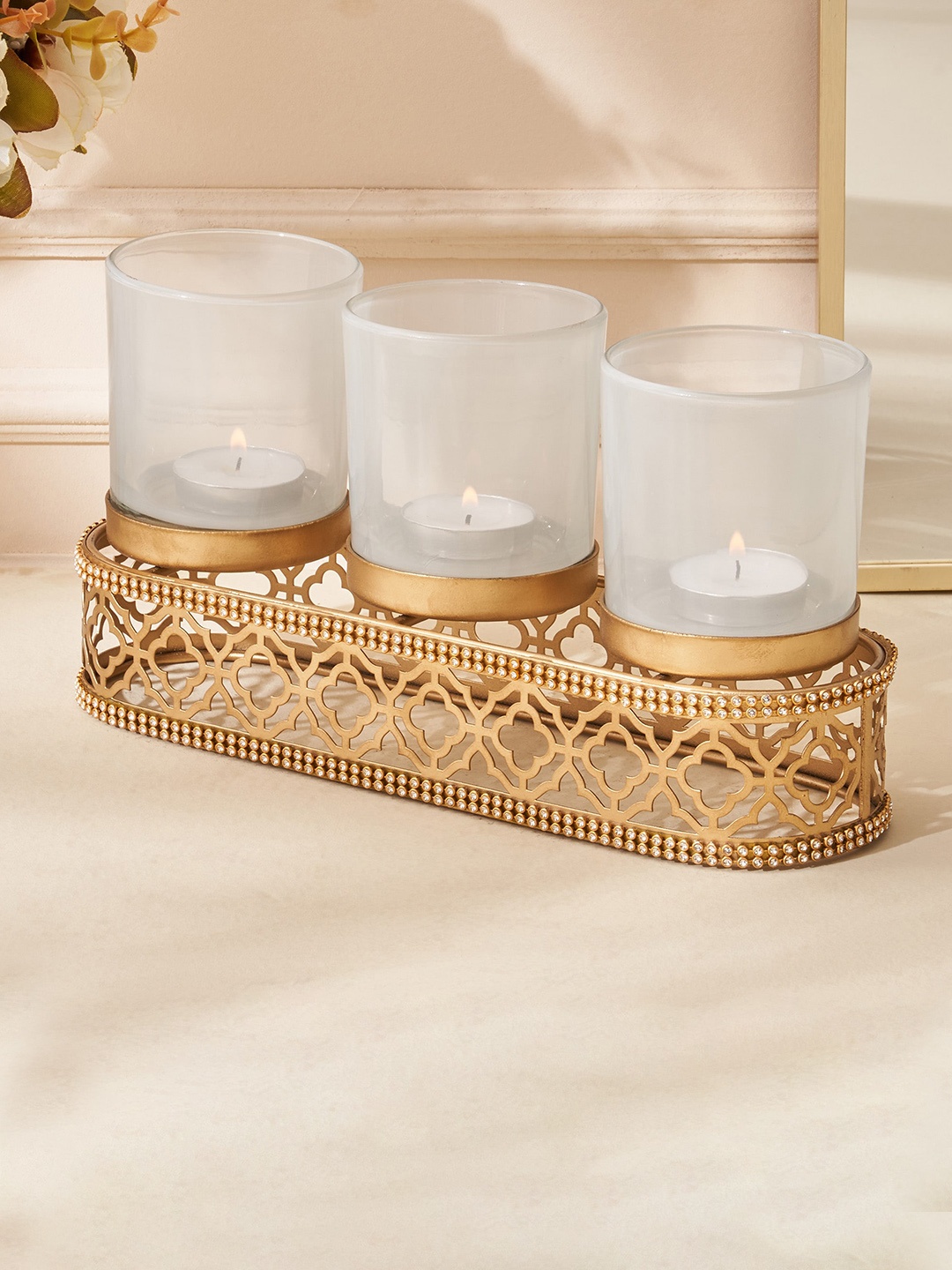 

Home Centre Rylee Gold Toned Glass Cut Work Multi T-Light Candle Holder