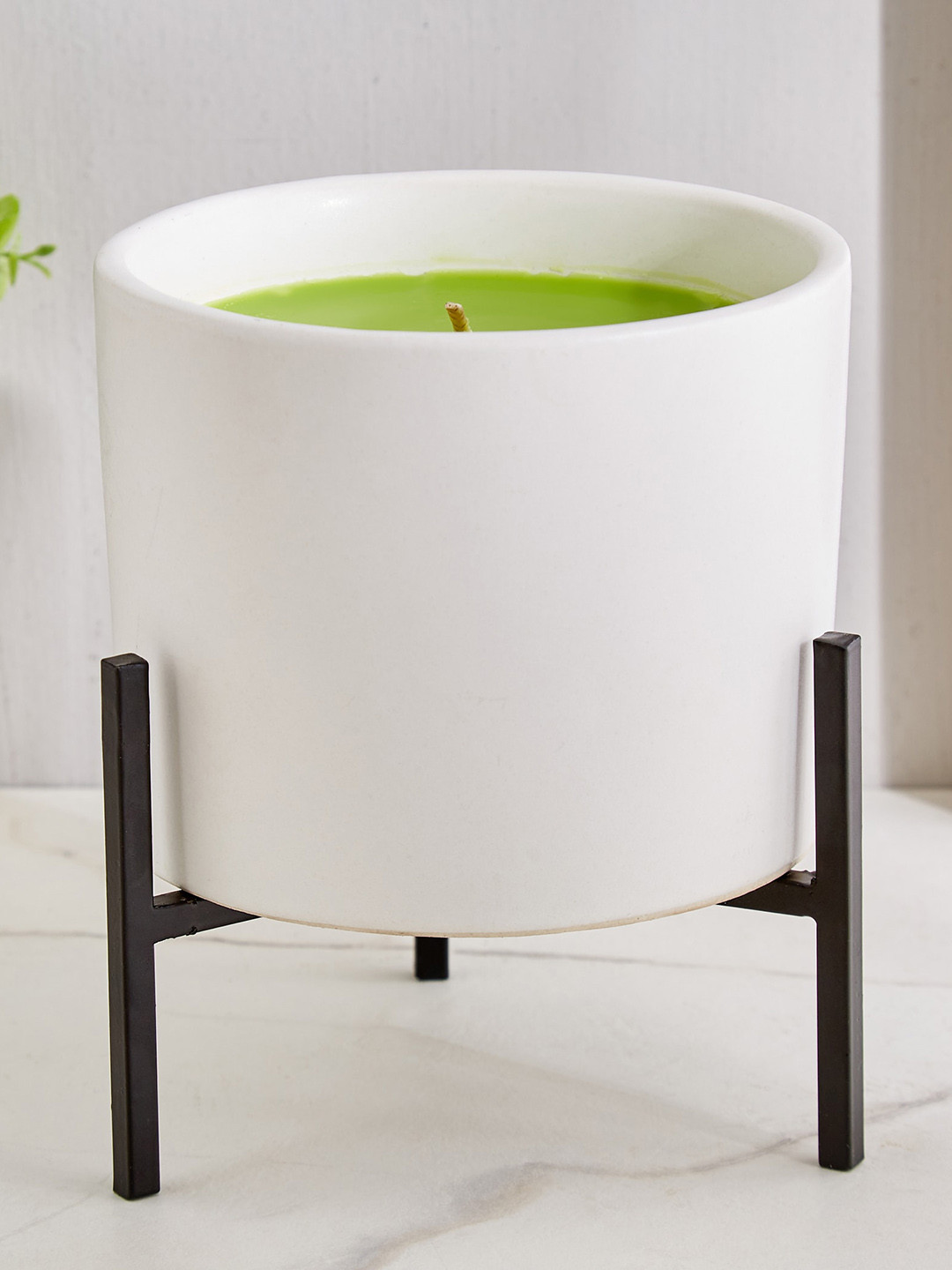 

Home Centre Enchanted Citronella White Scented Ceramic Candle With Stand