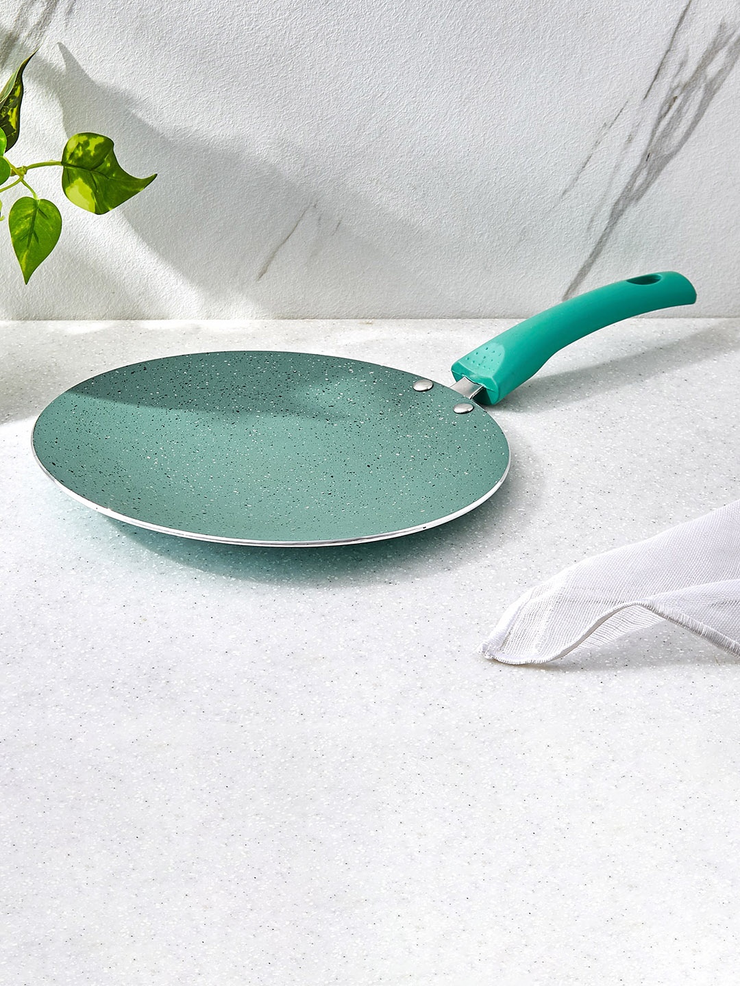 

Home Centre Nevada Teal Aluminum Concave Tawa-25 cm