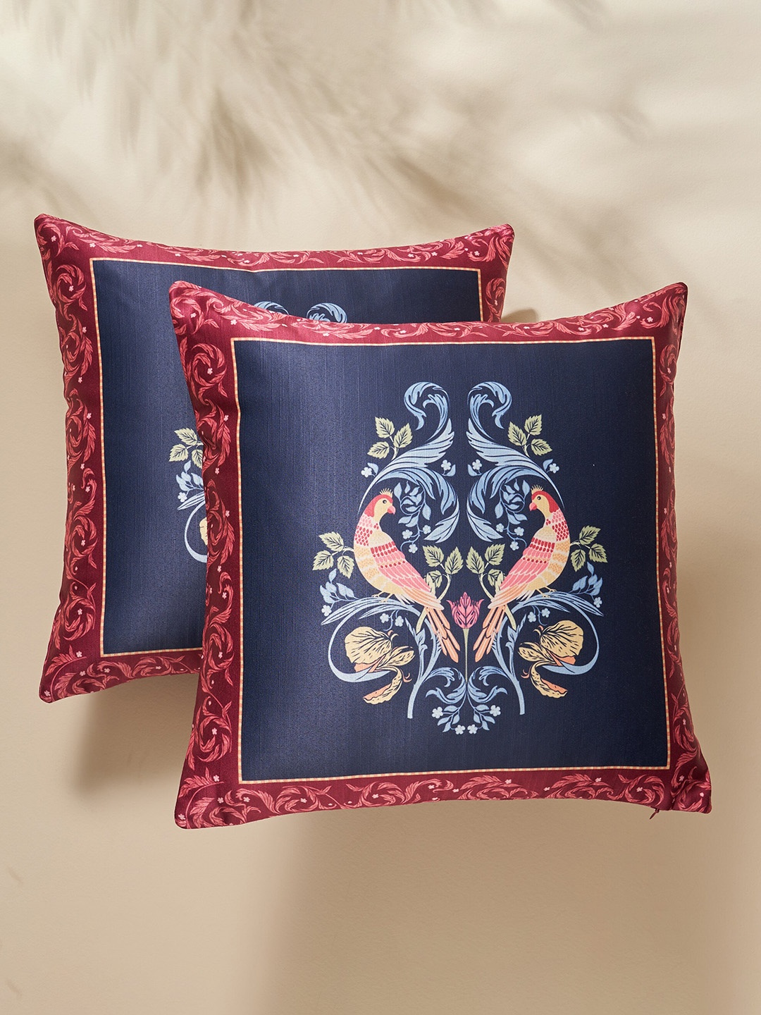 

Home Centre Feslix Artlover 2 Pcs Blue & Red Ethnic Motifs Square Cushion Covers