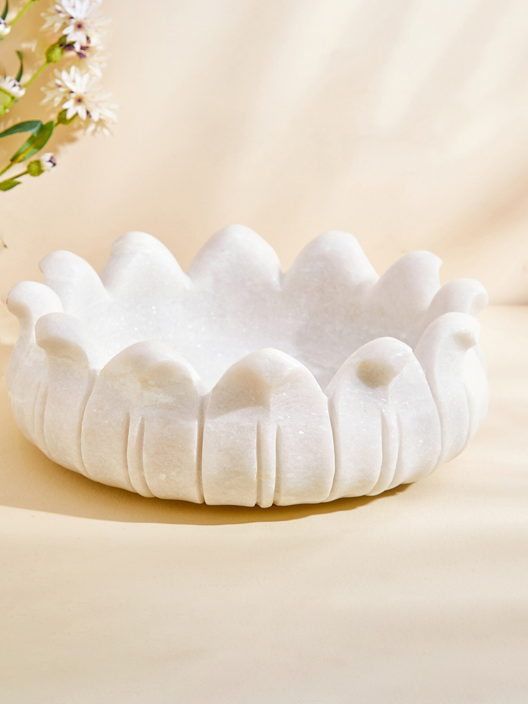 

Home Centre White Textured Marble Decorative Bowl