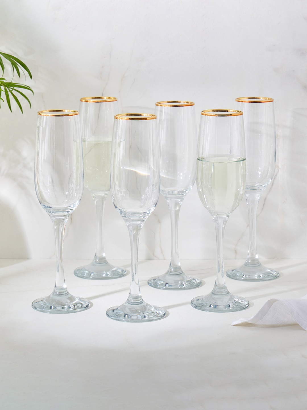 

Home Centre Kin Transparent 6 Pcs Champagne Glasses - 210 ML