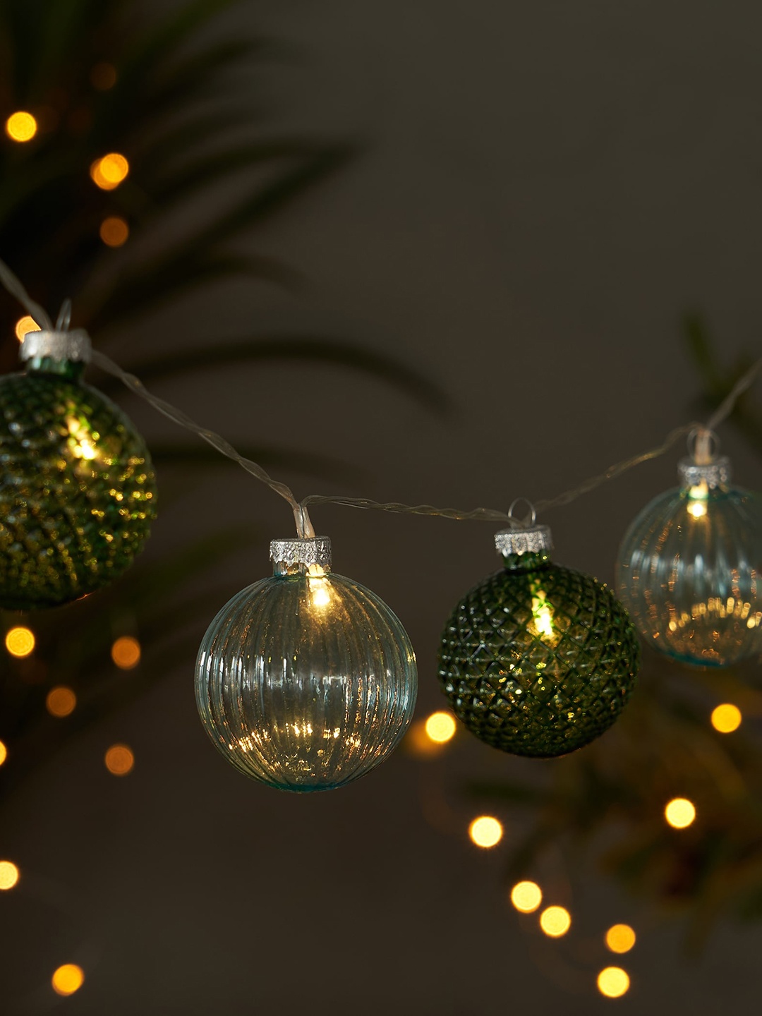 

Home Centre Green & Blue 7 Bulbs Serena Slice Glass Ball String Light