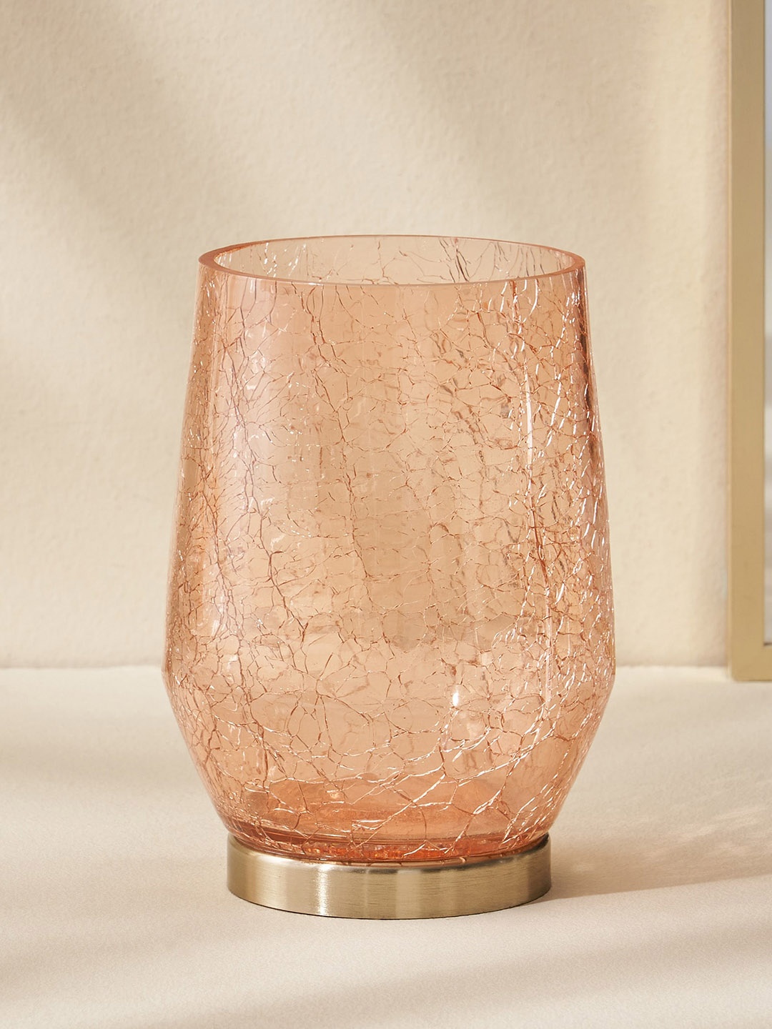 

Home Centre Brian Macia Peach Coloured Textured Votive Candle Holder