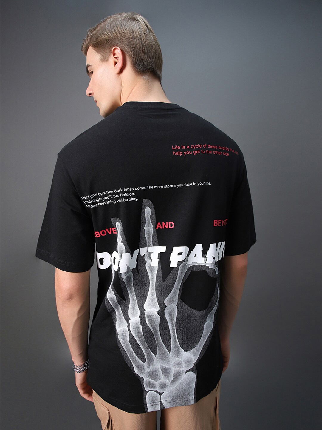 

Bewakoof Black Graphic Printed Drop Shoulder Sleeves Pure Cotton Oversized T-shirt