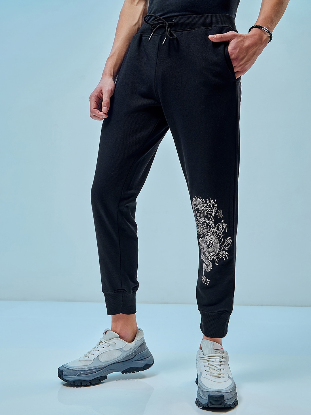 

Bewakoof Men Black Fleece Printed Terry Cotton Super Loose Fit Joggers