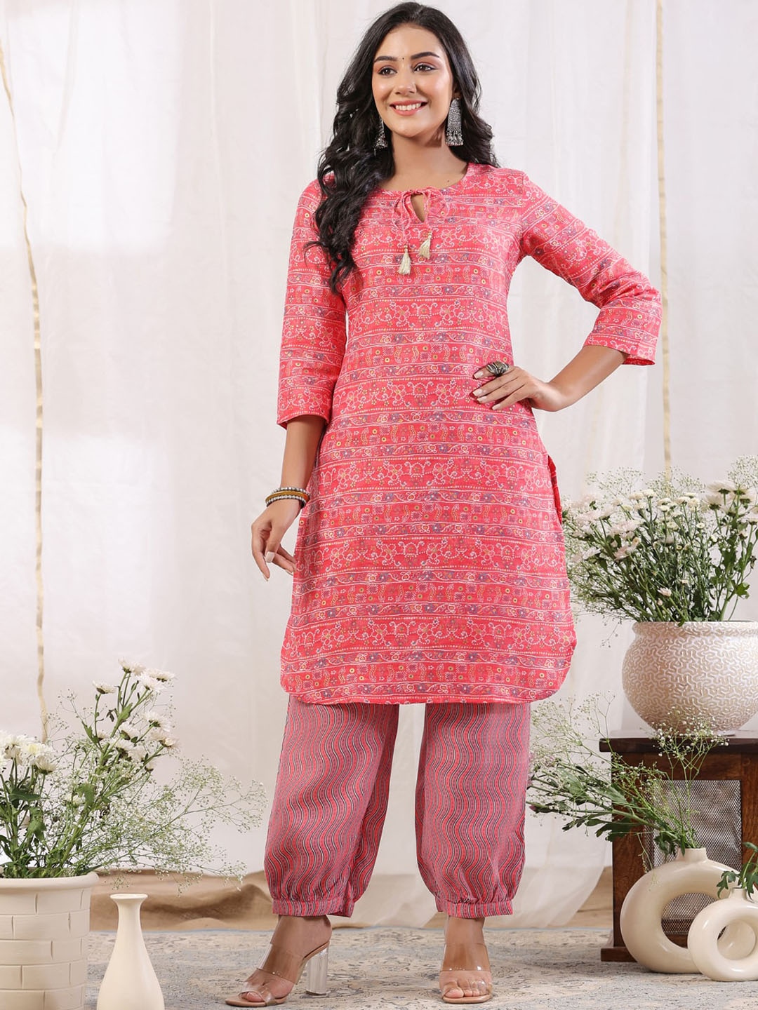 

Anubhutee Ethnic Motifs Printed Tie-Up Neck Regular Kurta With Salwar, Pink