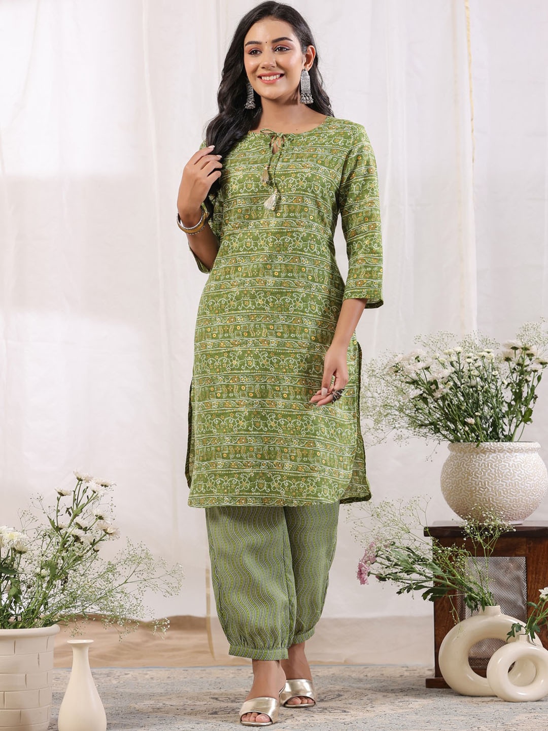

Anubhutee Ethnic Motifs Printed Tie-Up Neck Regular Kurta With Salwar, Green