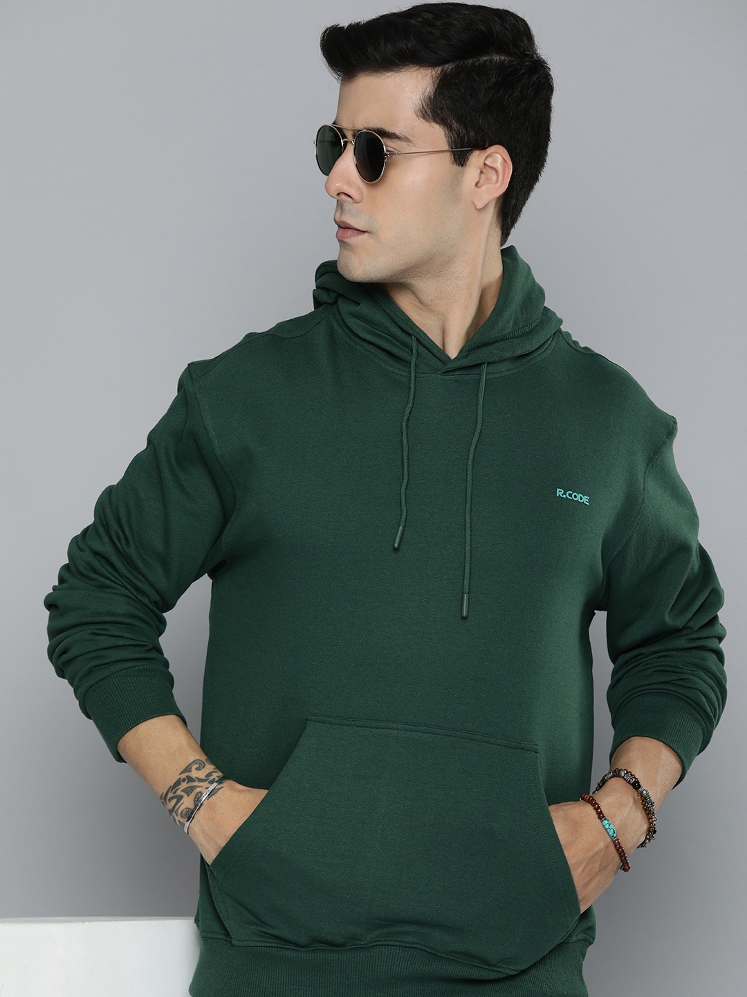 

R.Code by The Roadster Life Co. Men Solid Hooded Sweatshirt, Green