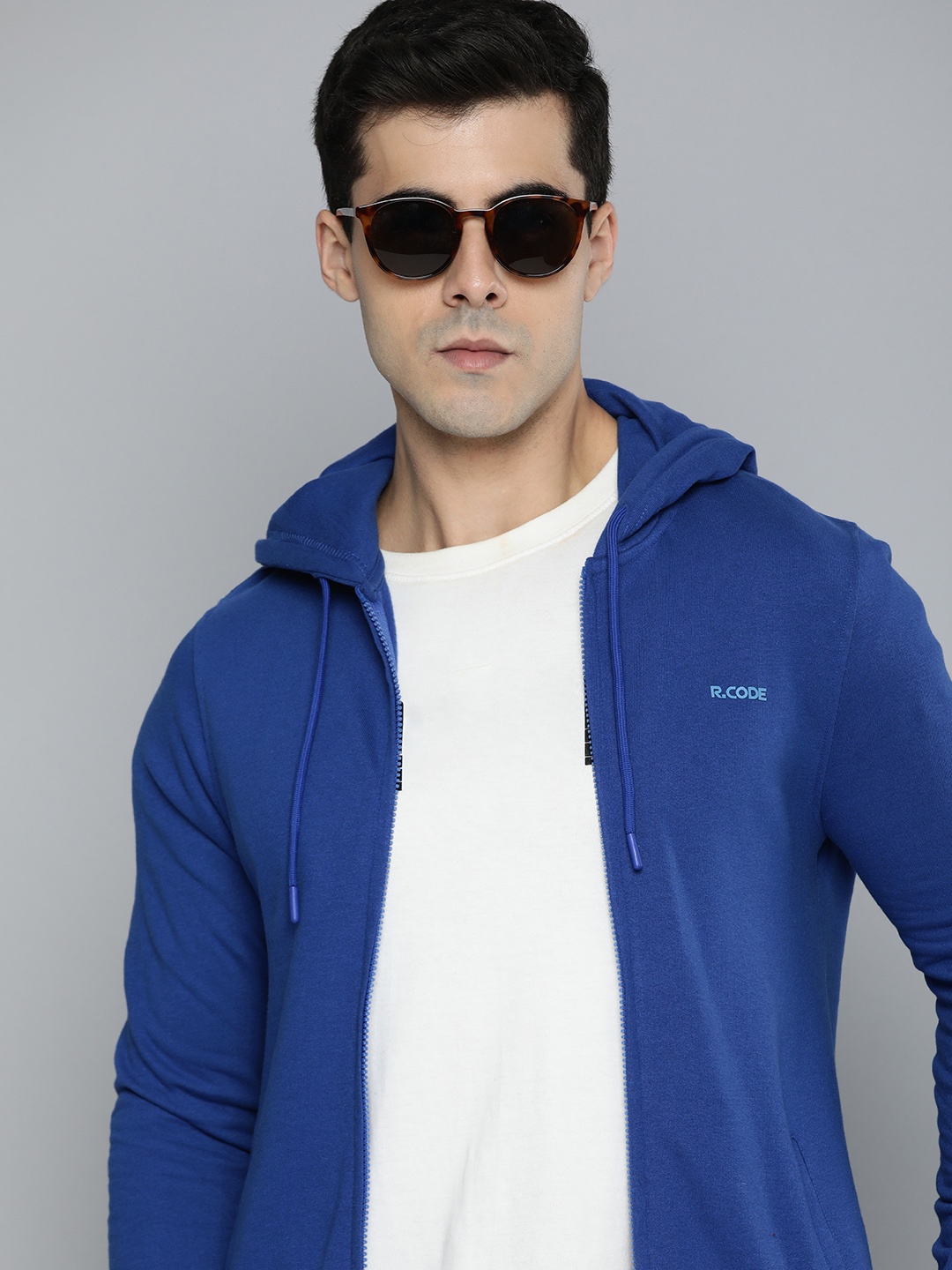 

R.Code by The Roadster Life Co. Men Solid Hooded Sweatshirt, Blue