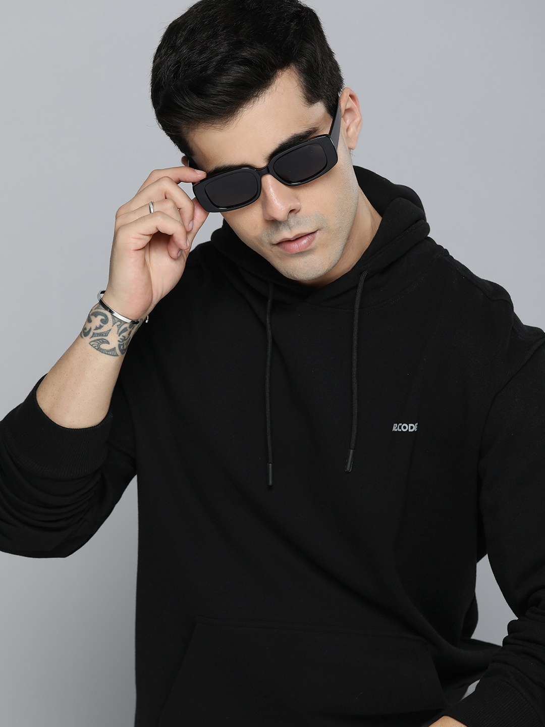 

R.Code by The Roadster Life Co. Men Solid Hooded Sweatshirt, Black