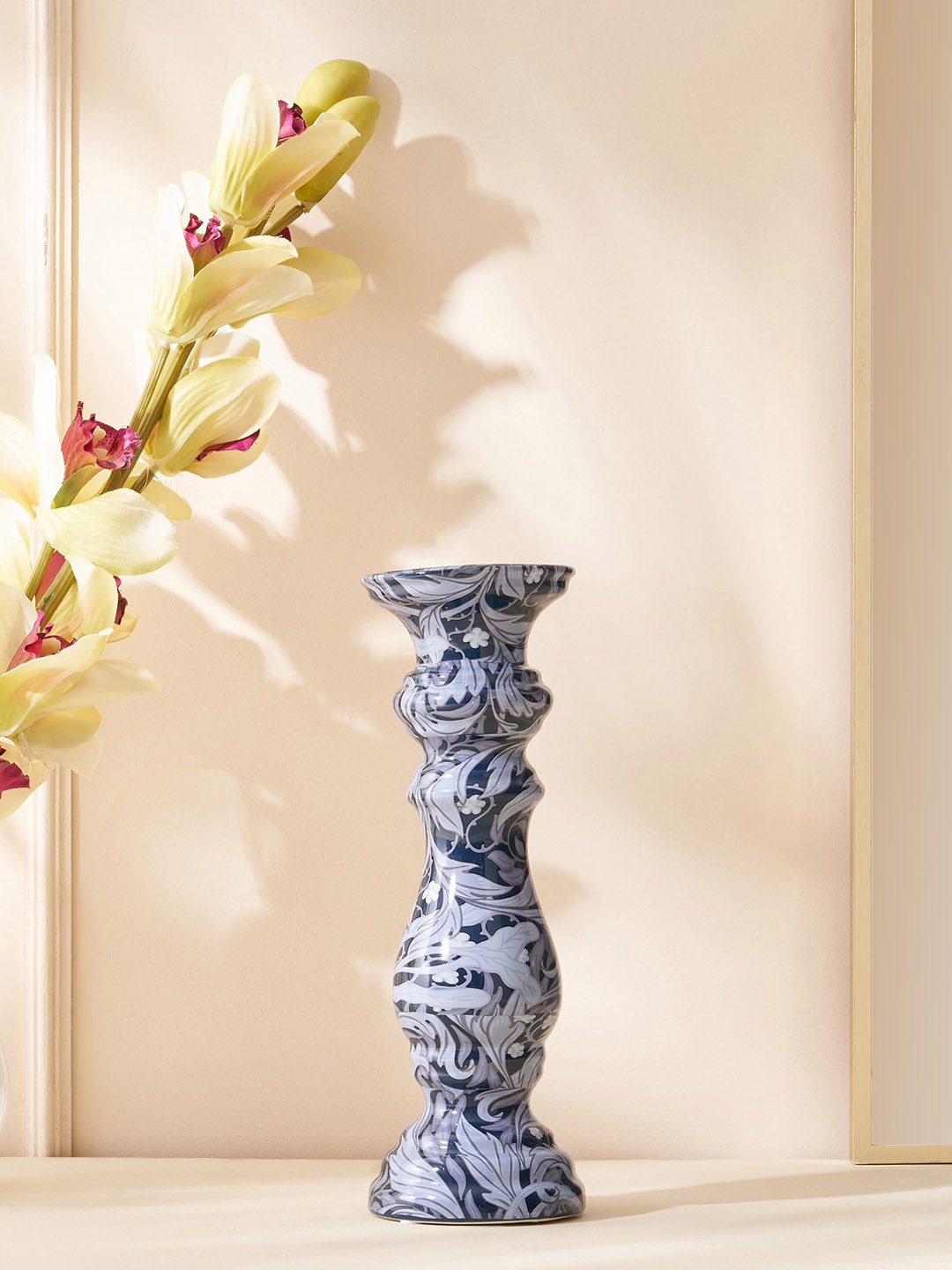 

Home Centre Feslix Matilda Blue & White Textured Ceramic Candle Holder