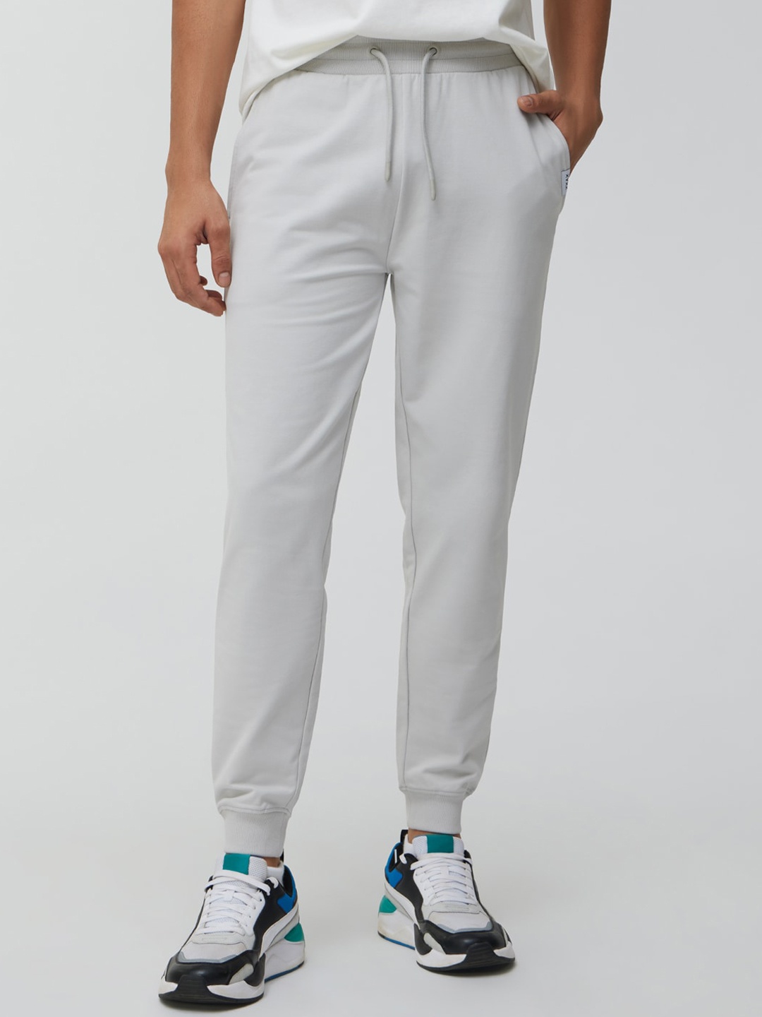 

XYXX Men Slim Fit Solid Chrome White Joggers