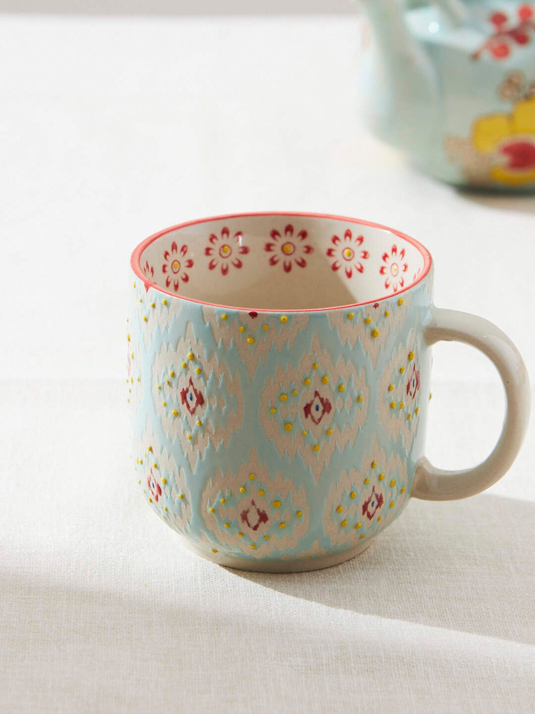 

Chumbak Blue & Red Printed Ceramic Matte Mug 150 ml
