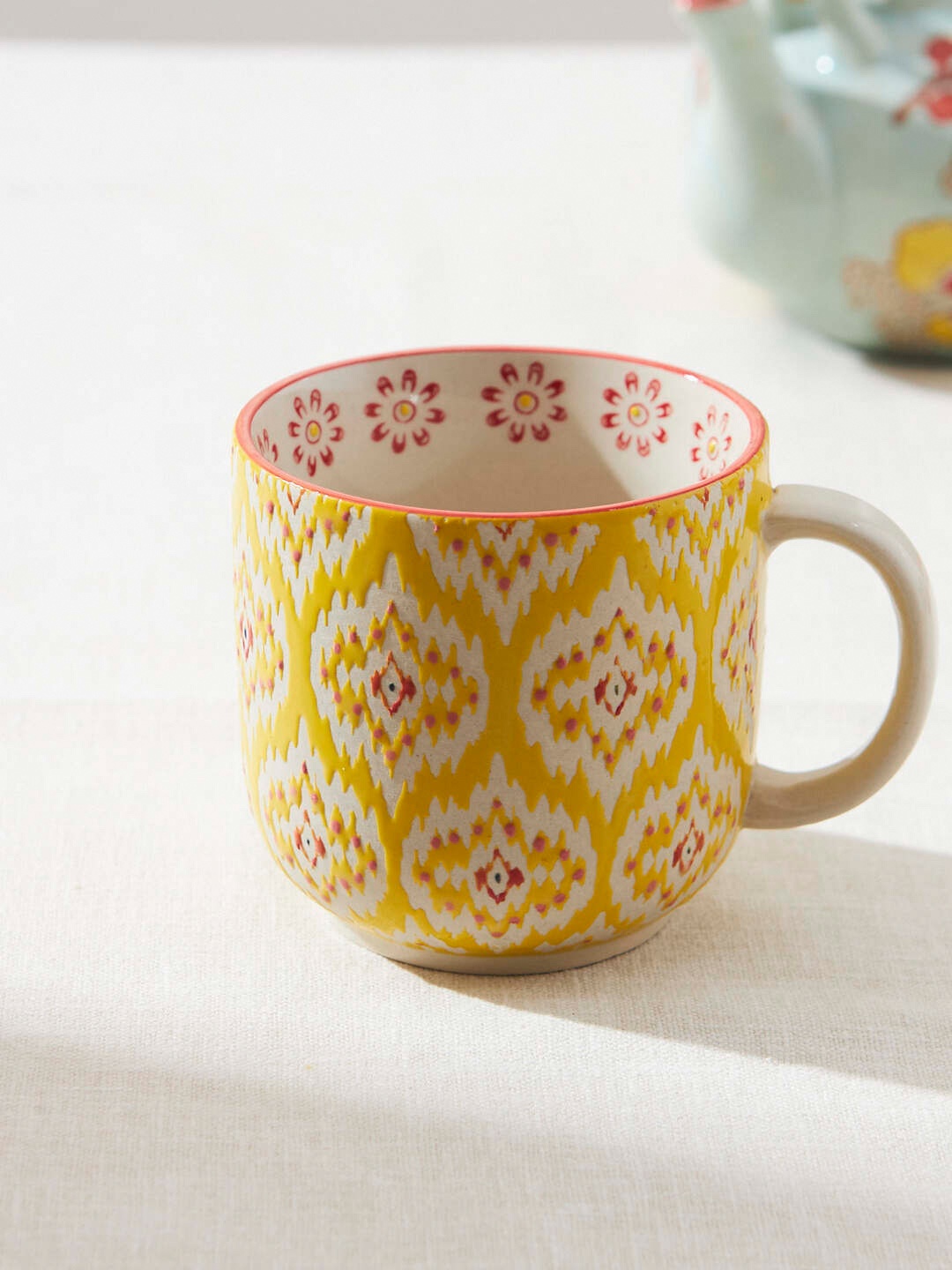 

Chumbak Yellow & White Printed Ceramic Matte Mug 150 ml