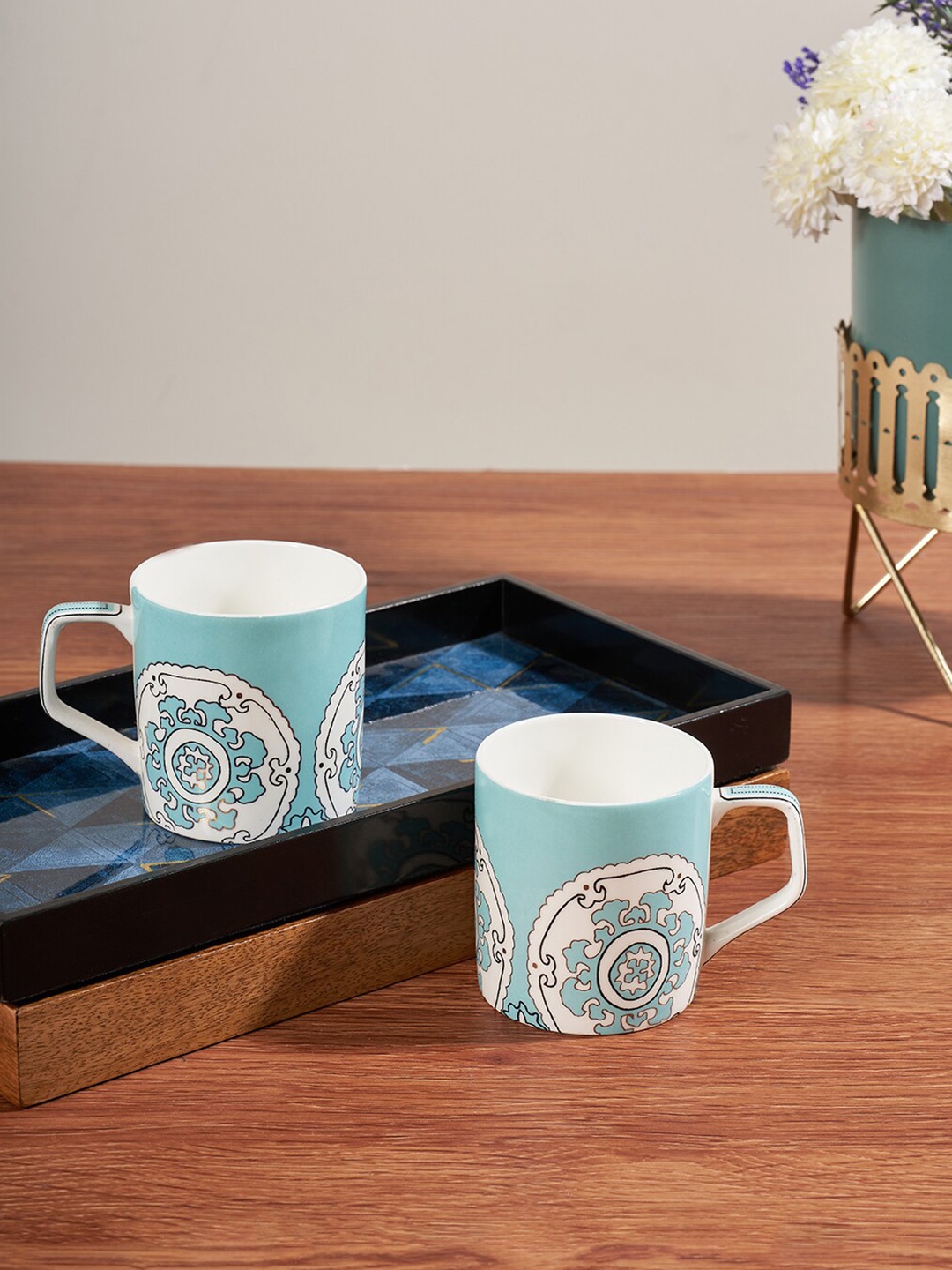

Living scapes by Pantaloons Blue & White Printed Bone China Glossy Mugs 300 ML Each