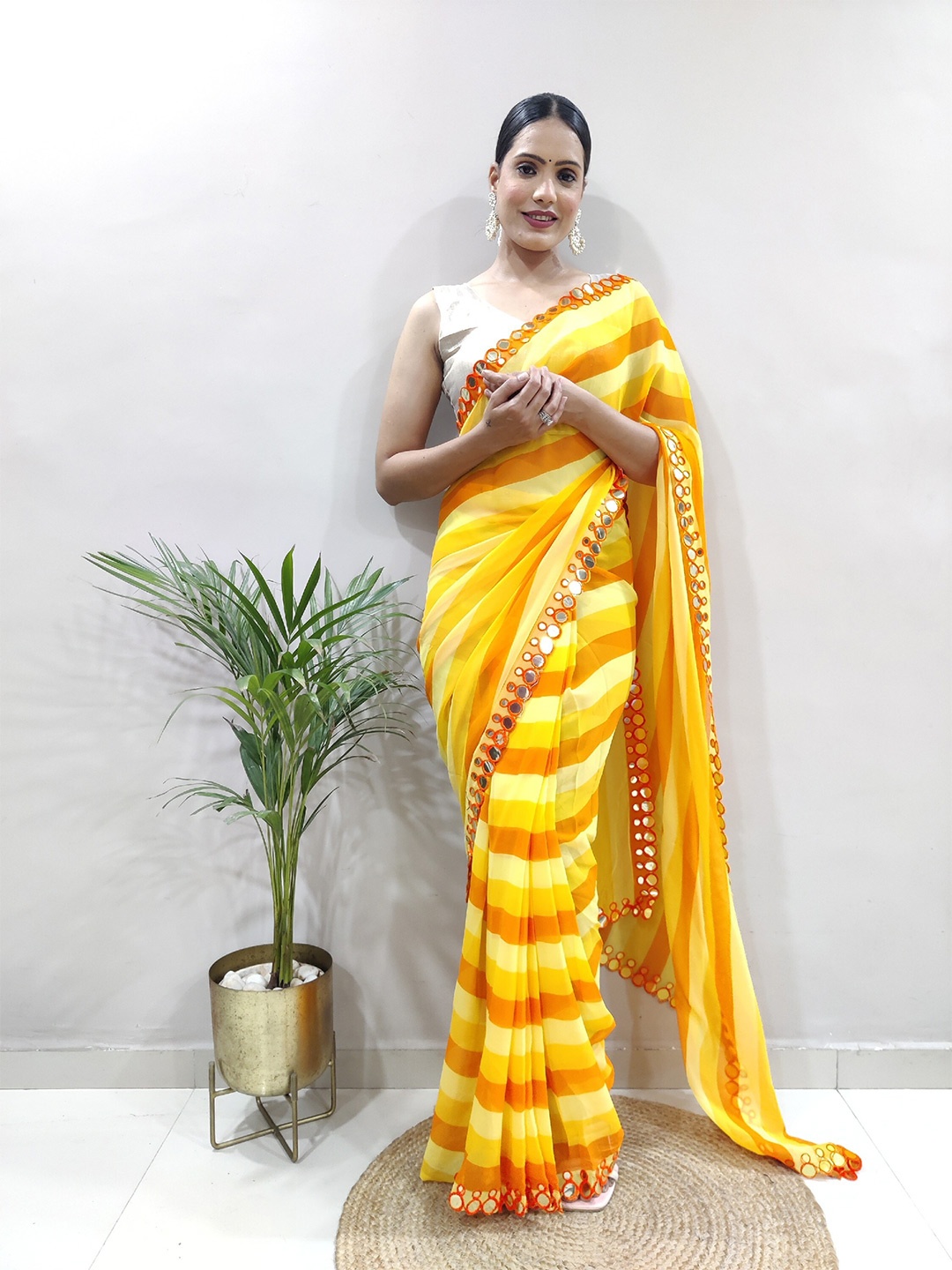 

DIVASTRI Striped Mirror Work Pure Georgette Block Print Saree, Yellow