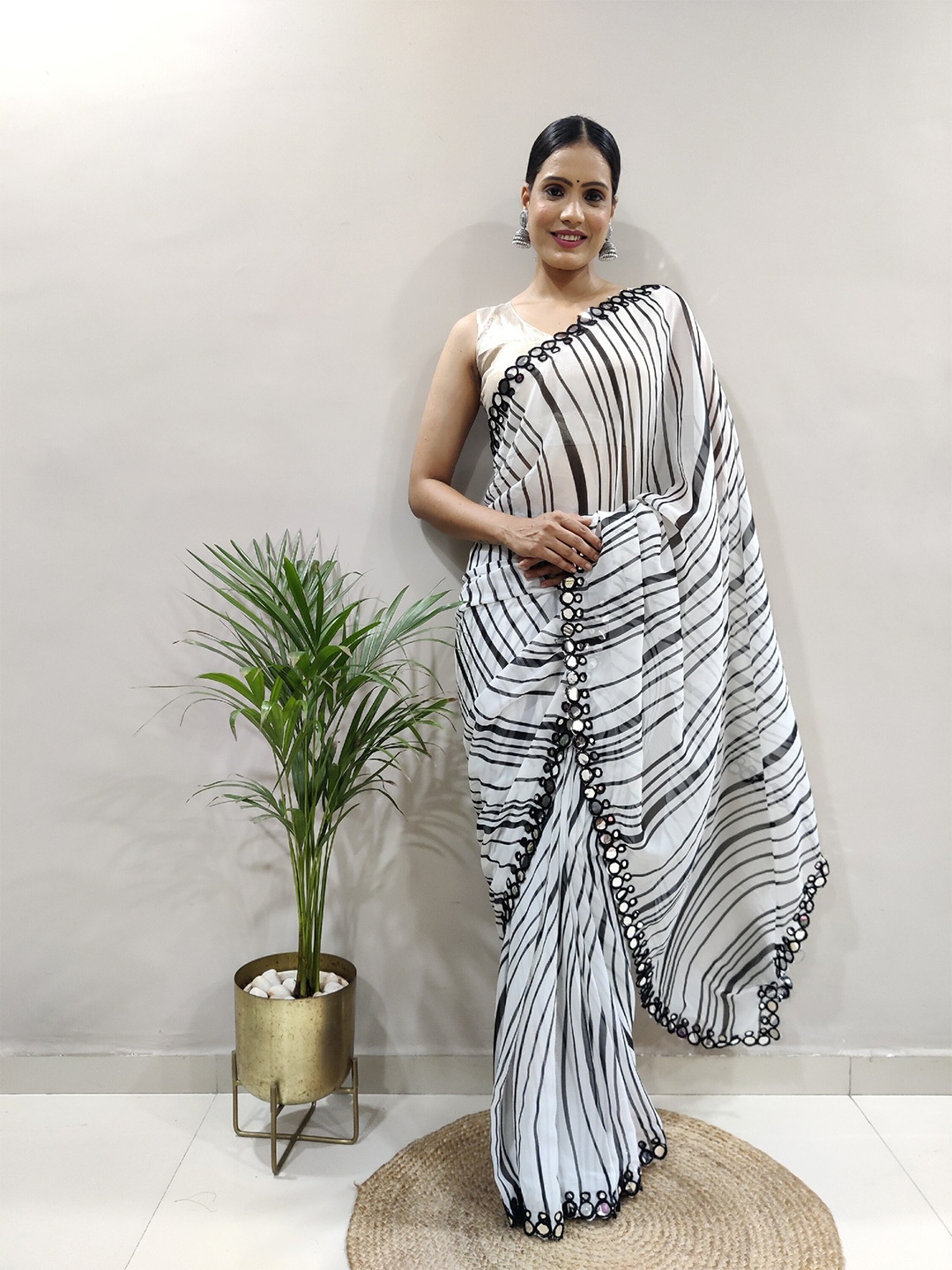 

DIVASTRI Striped Mirror Work Pure Georgette Block Print Saree, Black