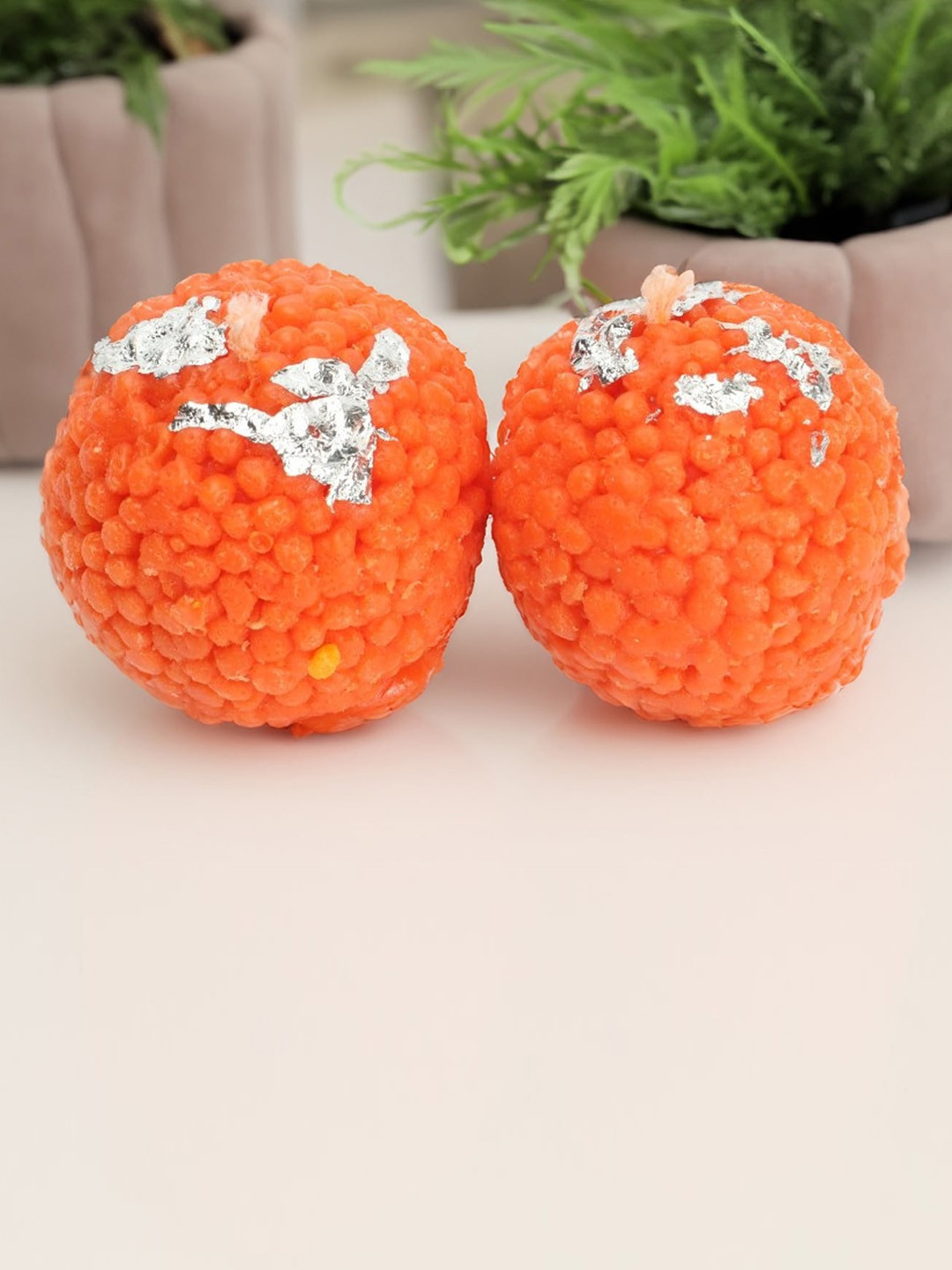 

ZAPATOZ Orange 12-Pieces Laddu Shaped Candles