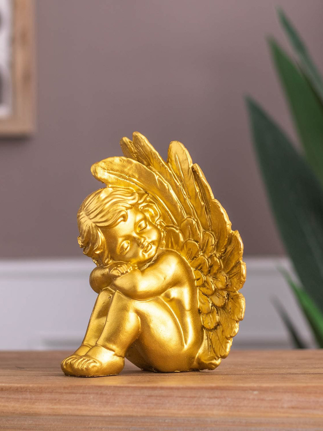 

THEDECORKART Gold-Toned Ceramic Figurine Showpiece