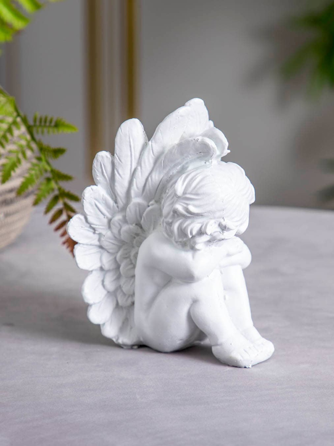 

THEDECORKART White Ceramic Figurine Showpiece