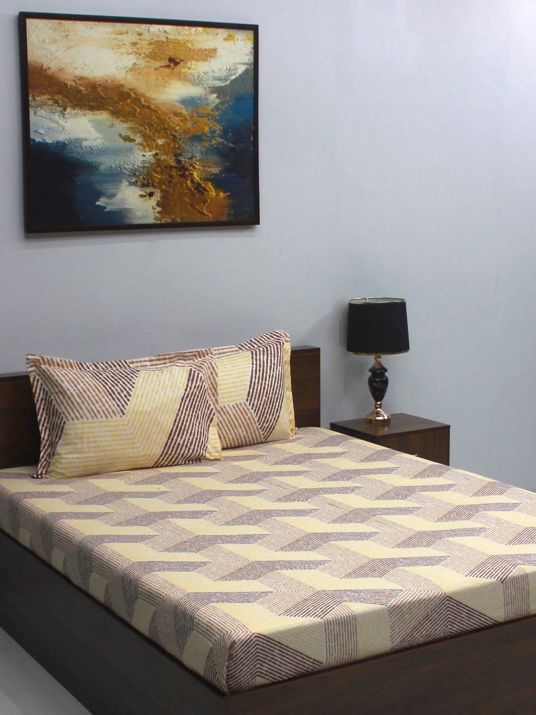

BOMBAY DYEING Yellow & Brown Printed Cotton 104 TC Queen Bedsheet with 2 Pillow Covers