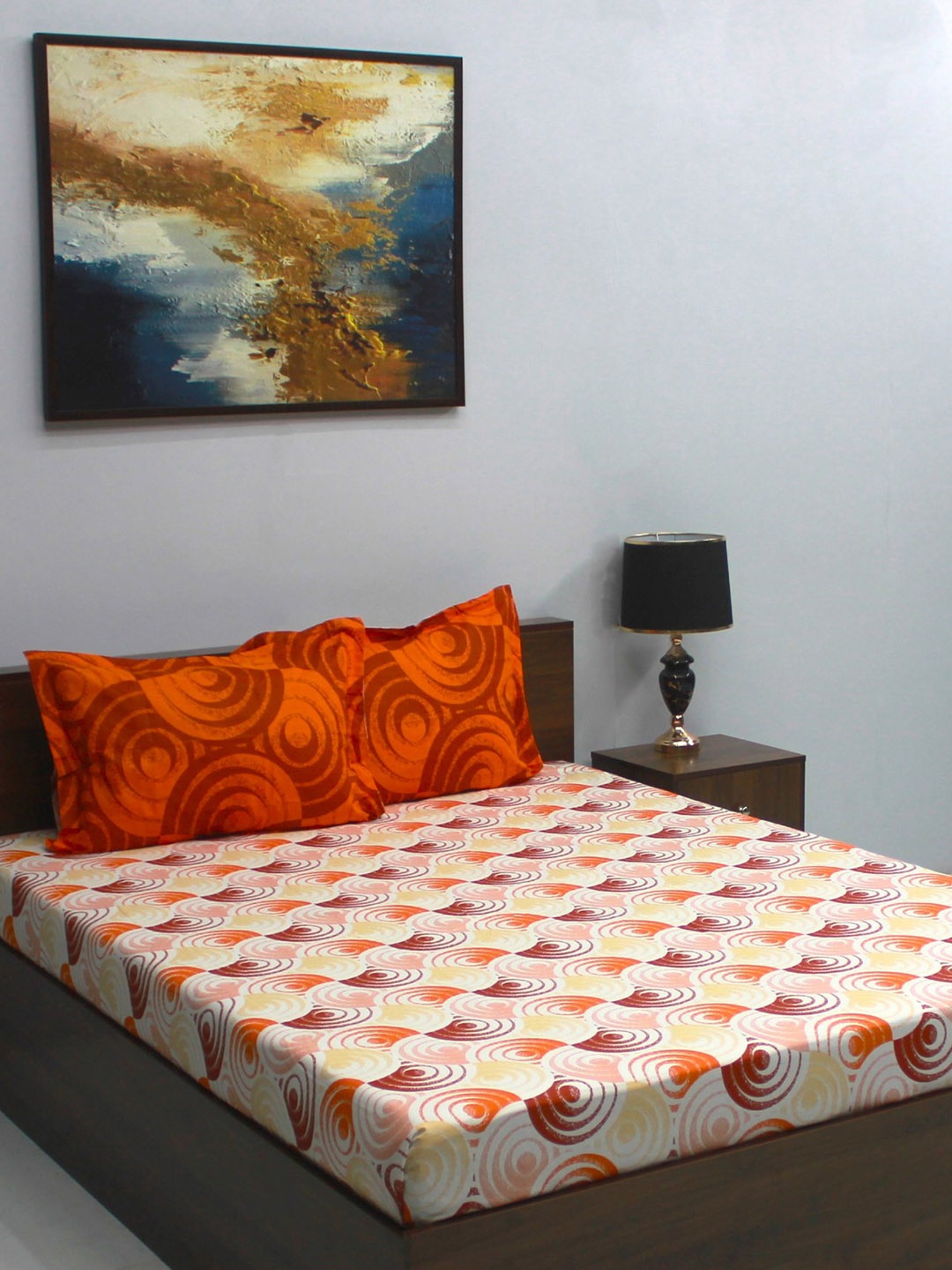 

BOMBAY DYEING Glory Rust & White Geometric Cotton 104 TC Queen Bedsheet & 2 Pillow Covers