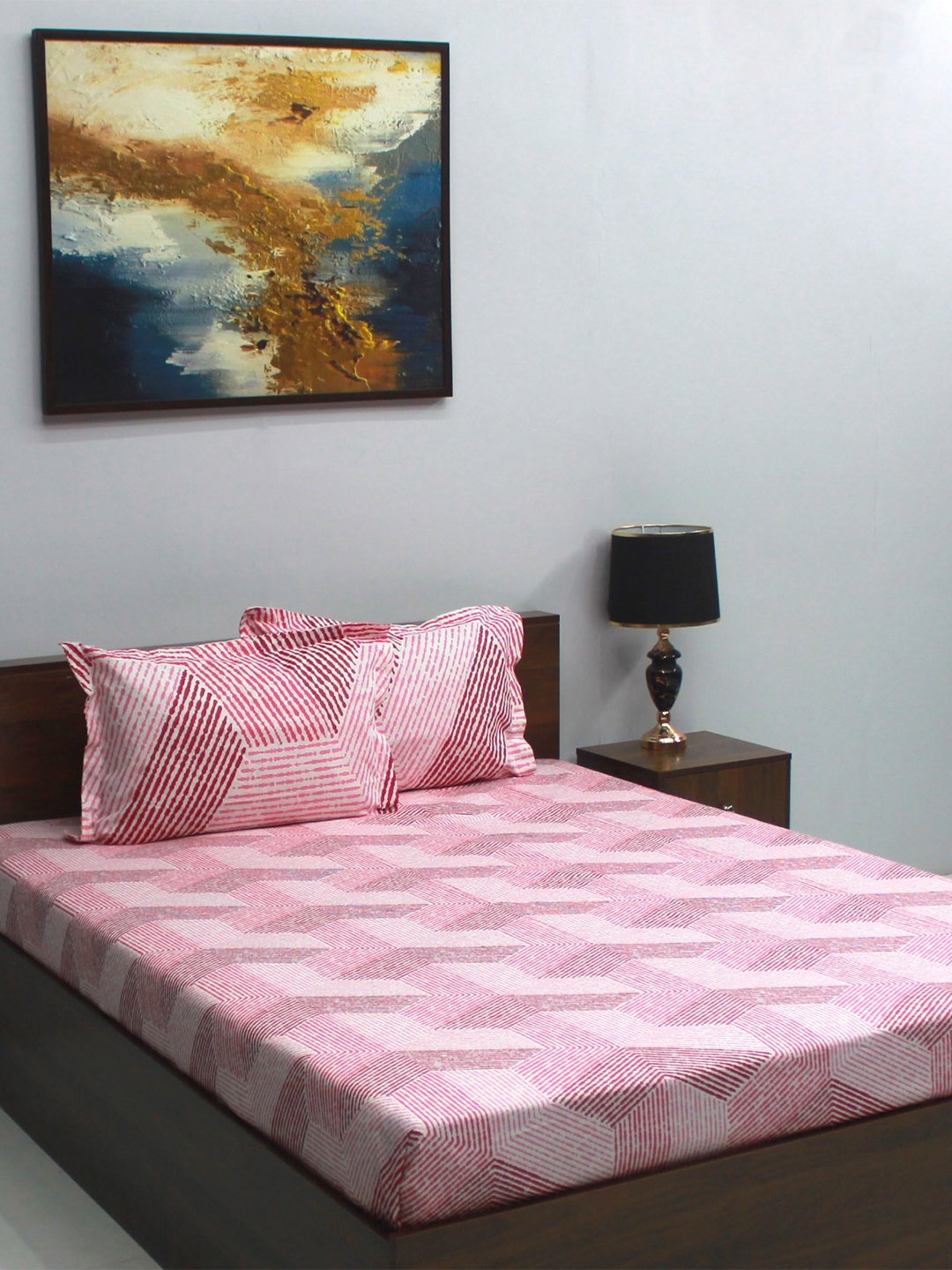 

BOMBAY DYEING Glory Pink Geometric Cotton 104 TC Queen Bedsheet with 2 Pillow Covers