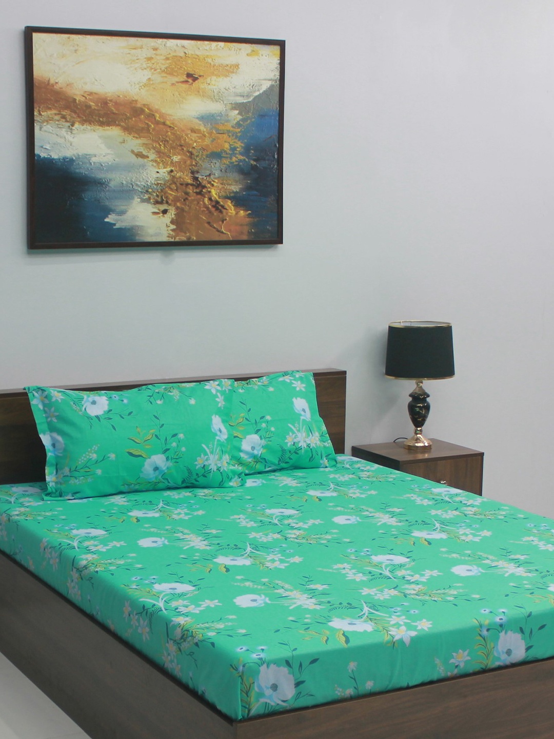 

BOMBAY DYEING Glory Blue & White Floral Cotton 104 TC Queen Bedsheet With 2 Pillow Covers