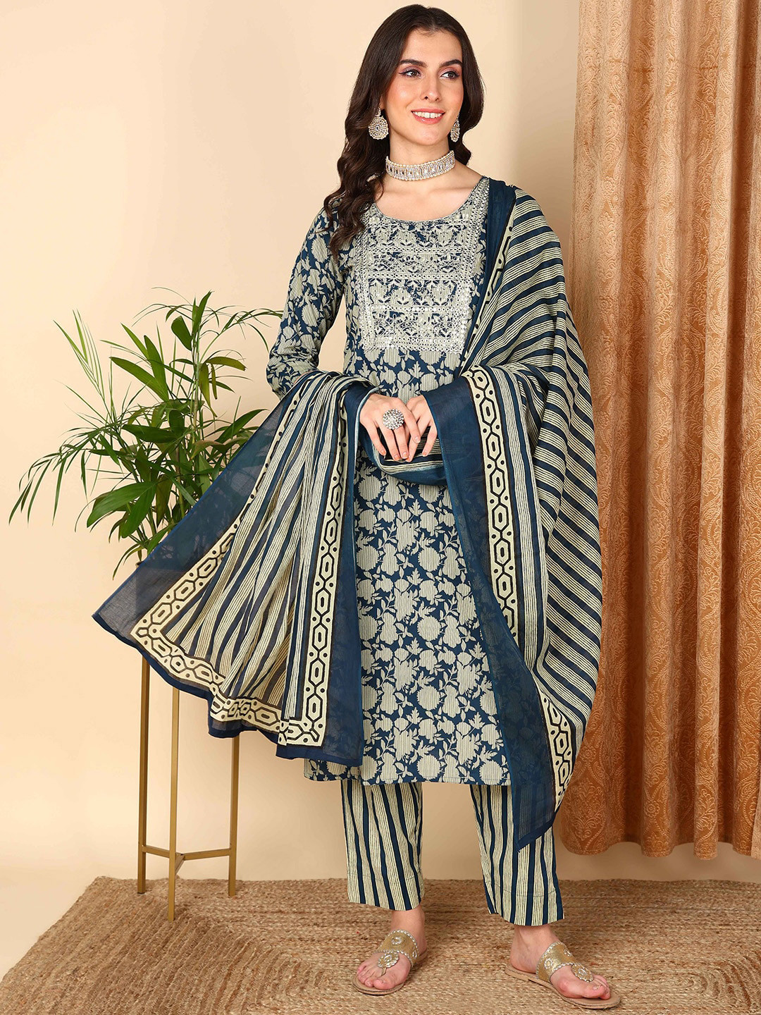 

AHIKA Navy Blue Floral Printed Regular Mirror Work Cotton Kurta With Trousers & Dupatta