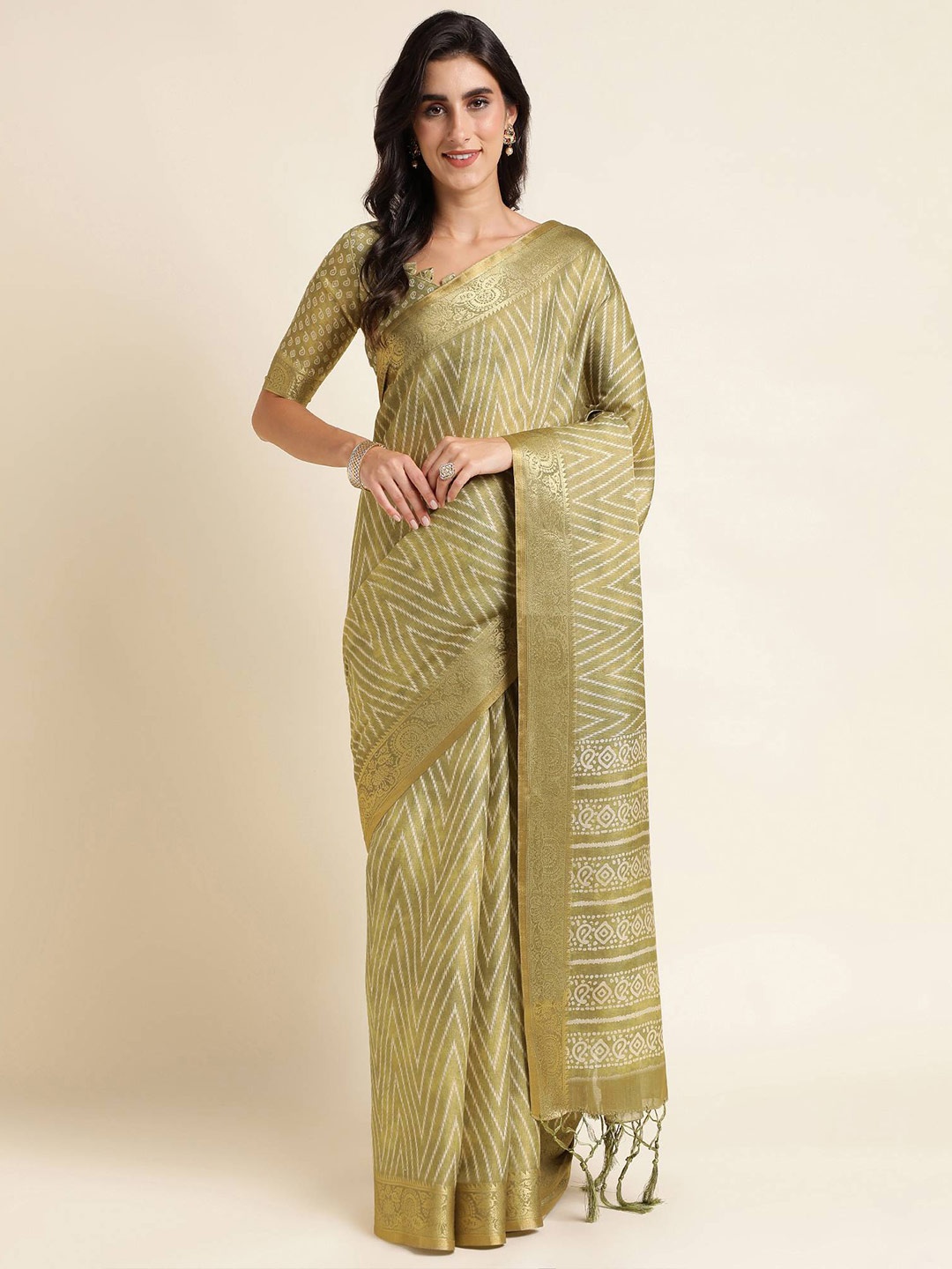 

Mitera Green & White Geometric Printed Zari Silk Cotton Saree