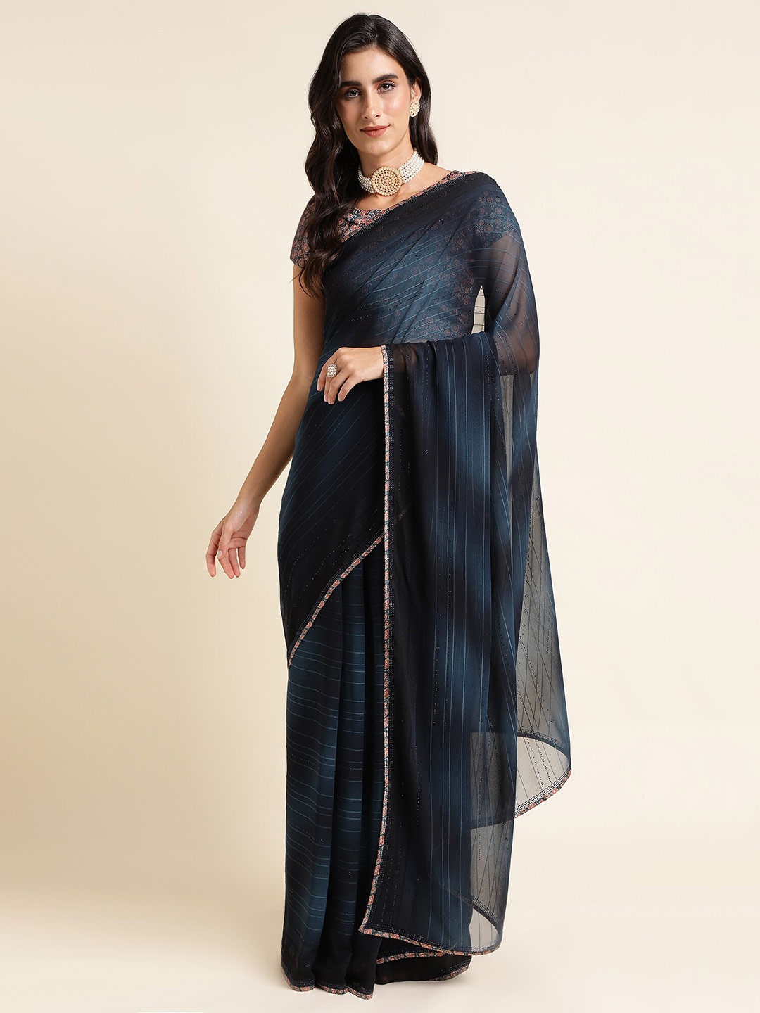 

Mitera Teal Blue Striped Pure Georgette Saree
