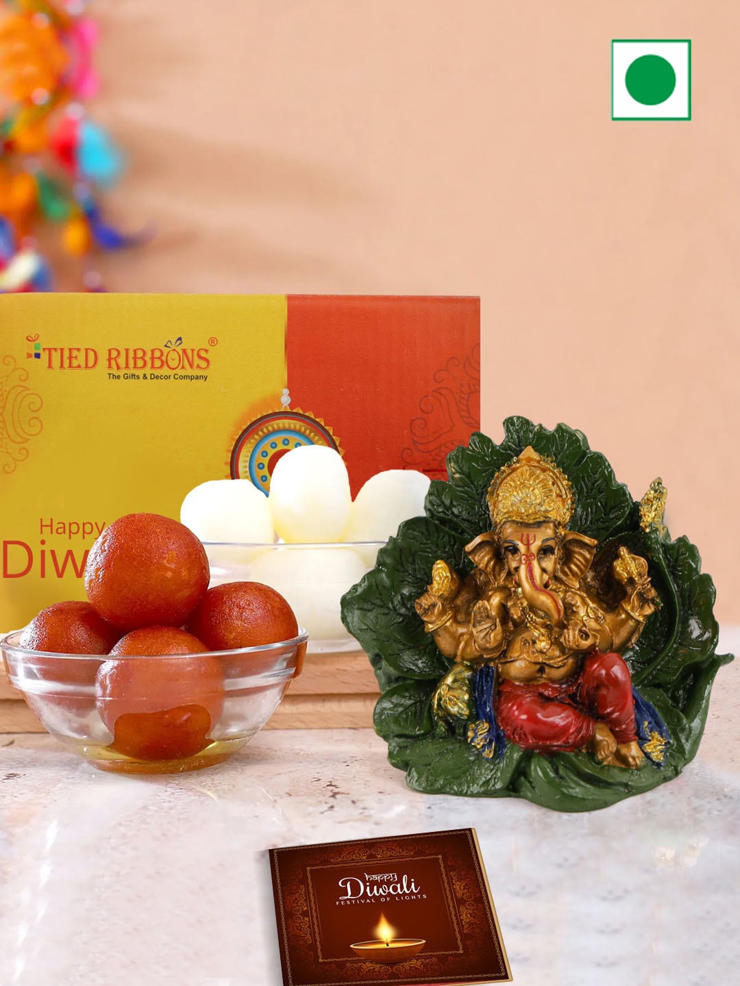 

TIED RIBBONS Diwali Gifts with Sweets Rasgulla Gulab Jamun & Ganesha Idol, Red