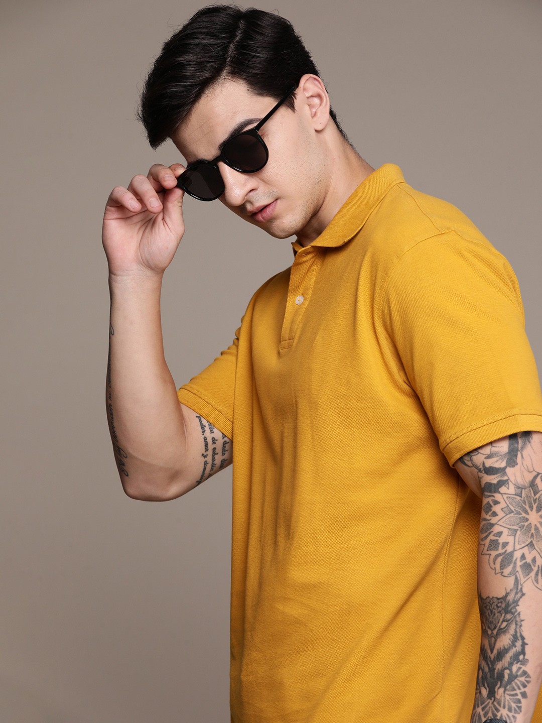 

Roadster Men Men Polo Collar Pure Cotton T-shirt, Mustard