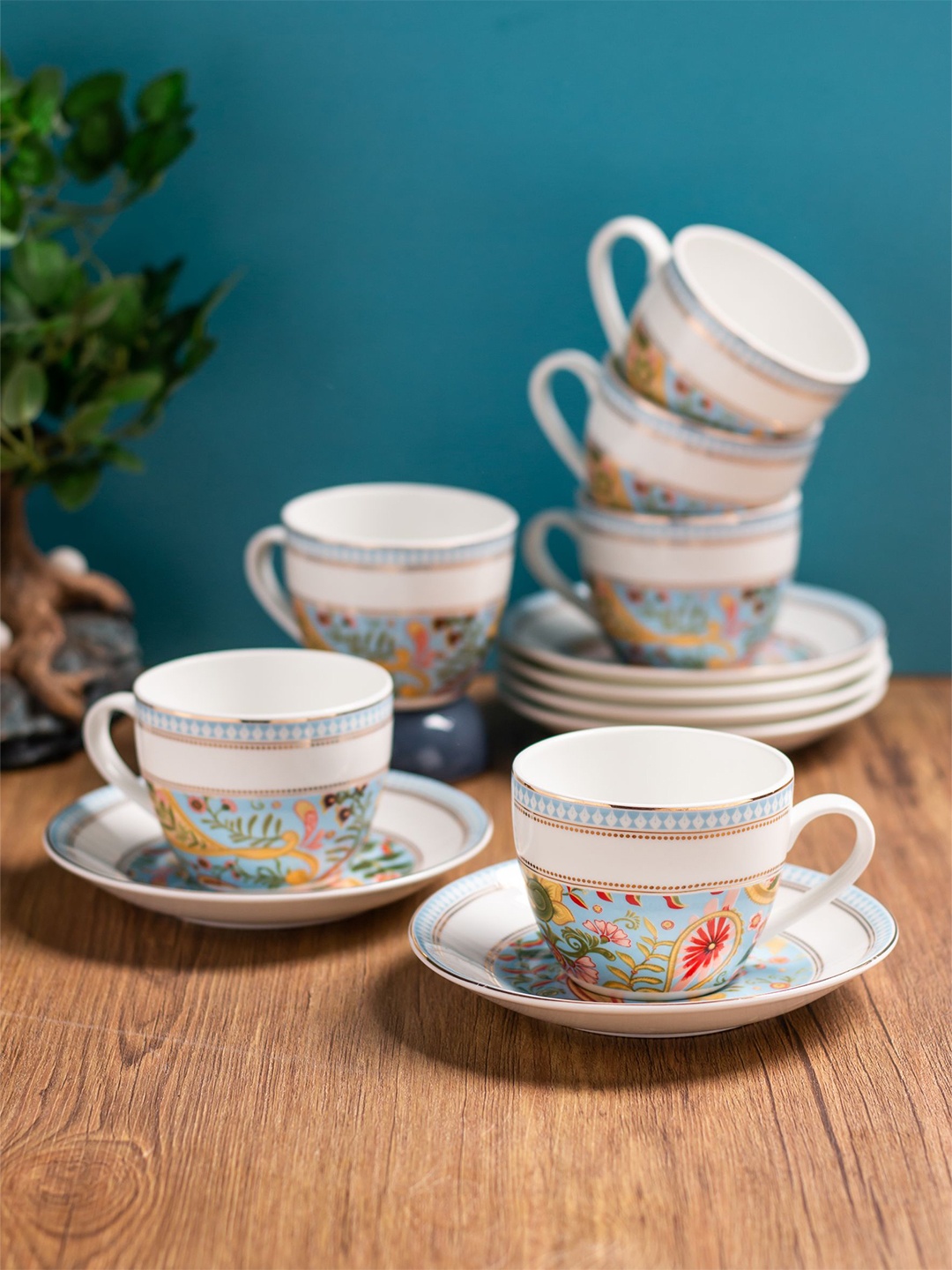 

CLAY CRAFT White 12 Pieces Printed Ceramic Glossy Cups and Saucers 180 ML Each