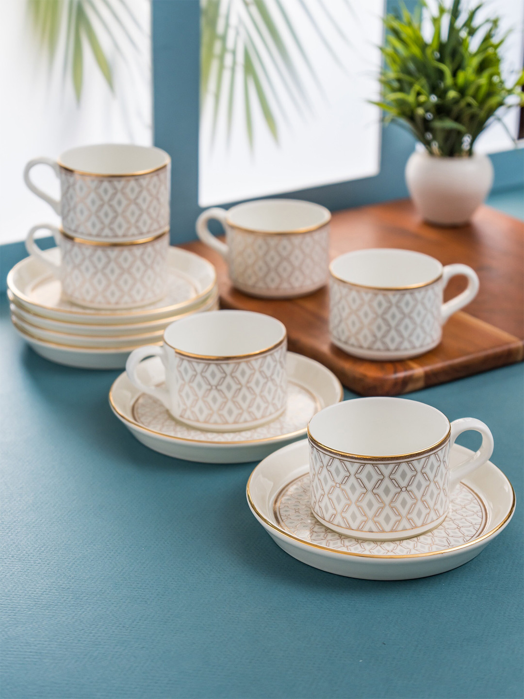 

CLAY CRAFT White & Gold-Toned 12 Pieces Printed Ceramic Glossy Cups & Saucers 180 ml