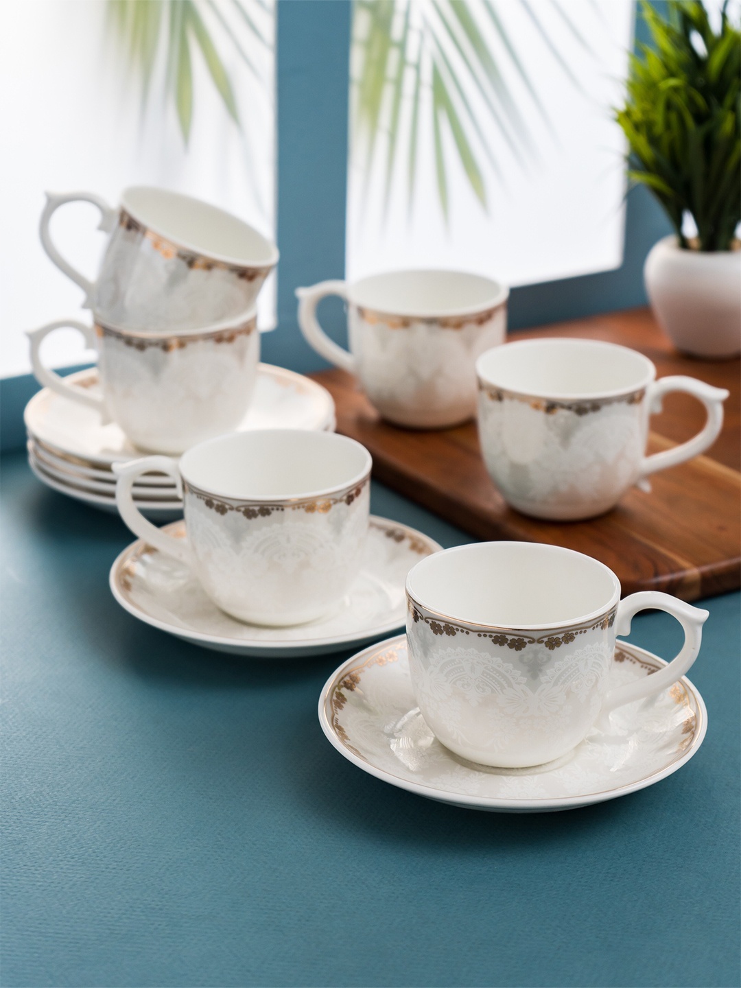 

CLAY CRAFT White & Gold-Toned 12 Pcs Printed Ceramic Glossy Cups and Saucers 180 Ml Each