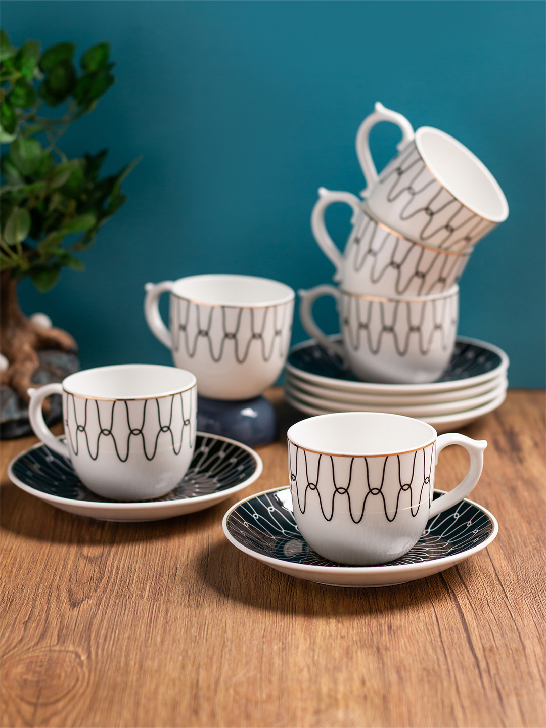 

CLAY CRAFT White & Black 12 Pieces Printed Ceramic Glossy Cups & Saucers 180 ml