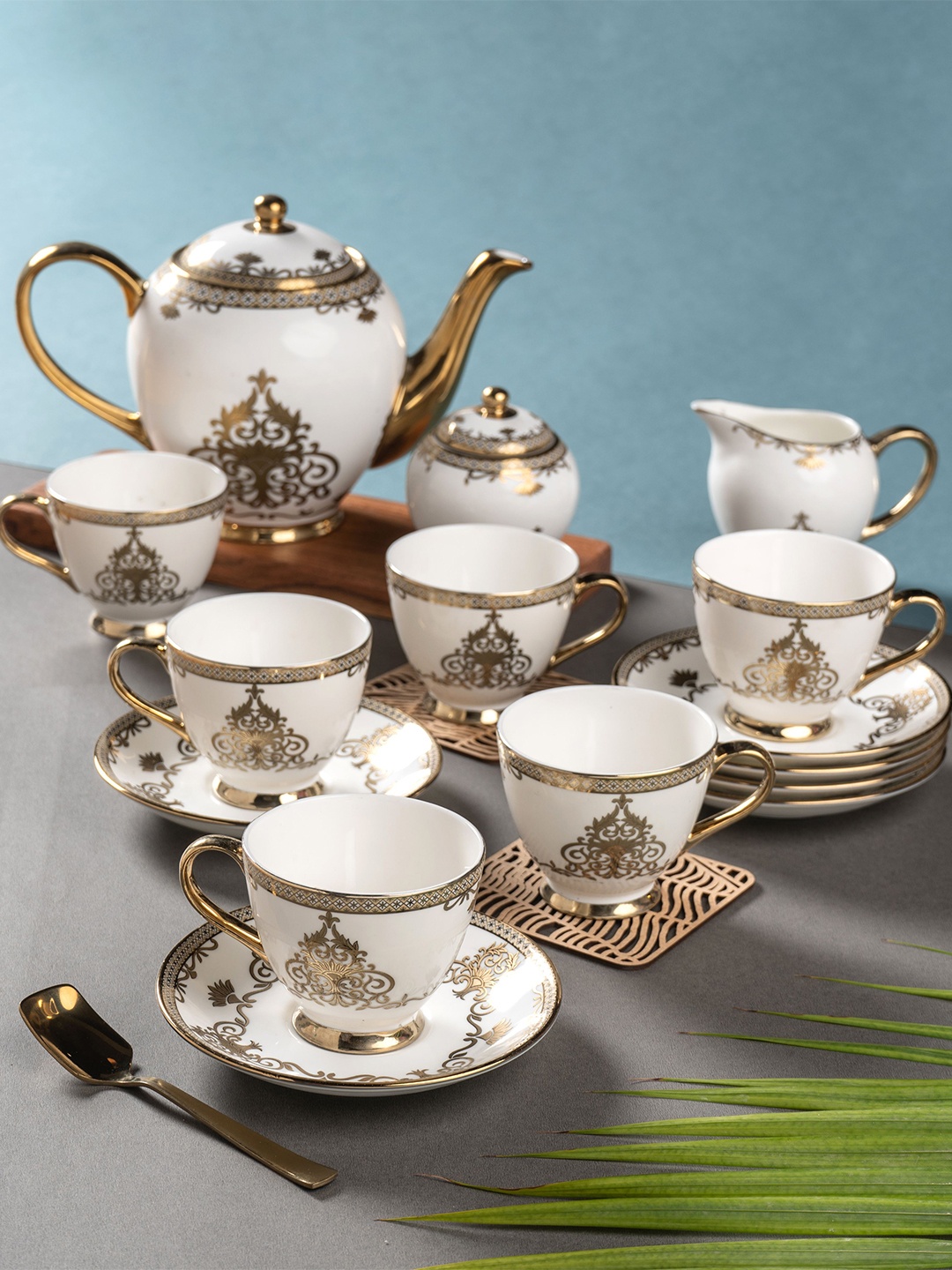 

CLAY CRAFT White & Gold-Toned 15 Pcs Ethnic Motifs Printed Ceramic Glossy Kettle Set