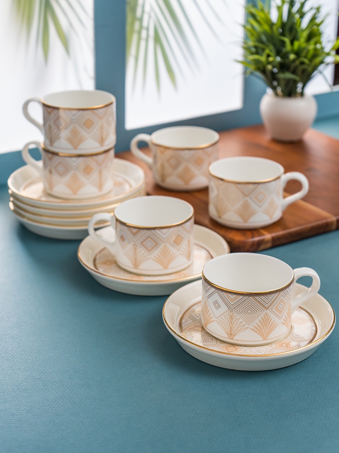 

CLAY CRAFT White & Gold-Toned 12 Pieces Geometric Printed Ceramic Glossy Cups and Saucers