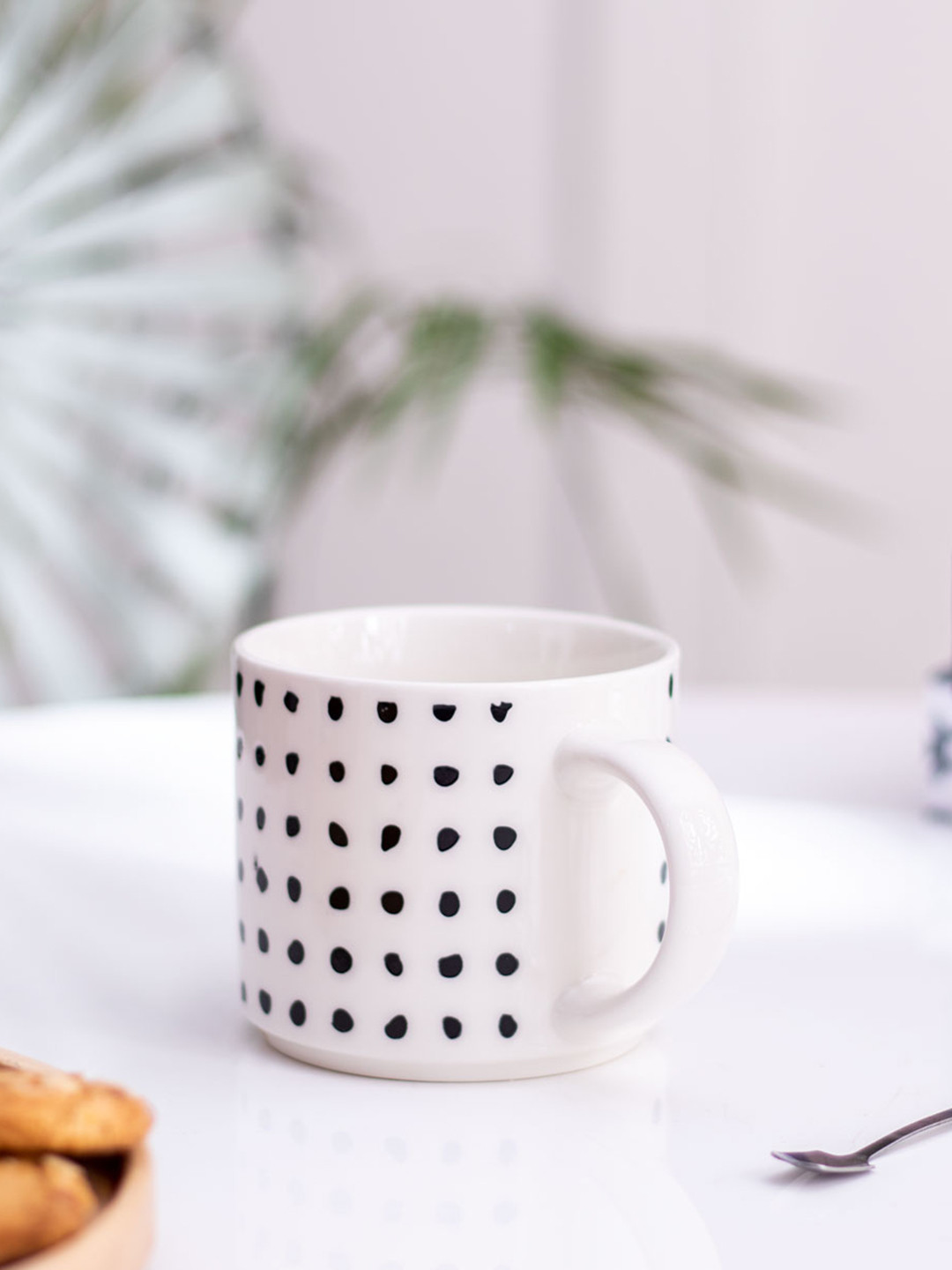 

THEDECORKART White & Black Printed Ceramic Glossy Mugs 300 ml