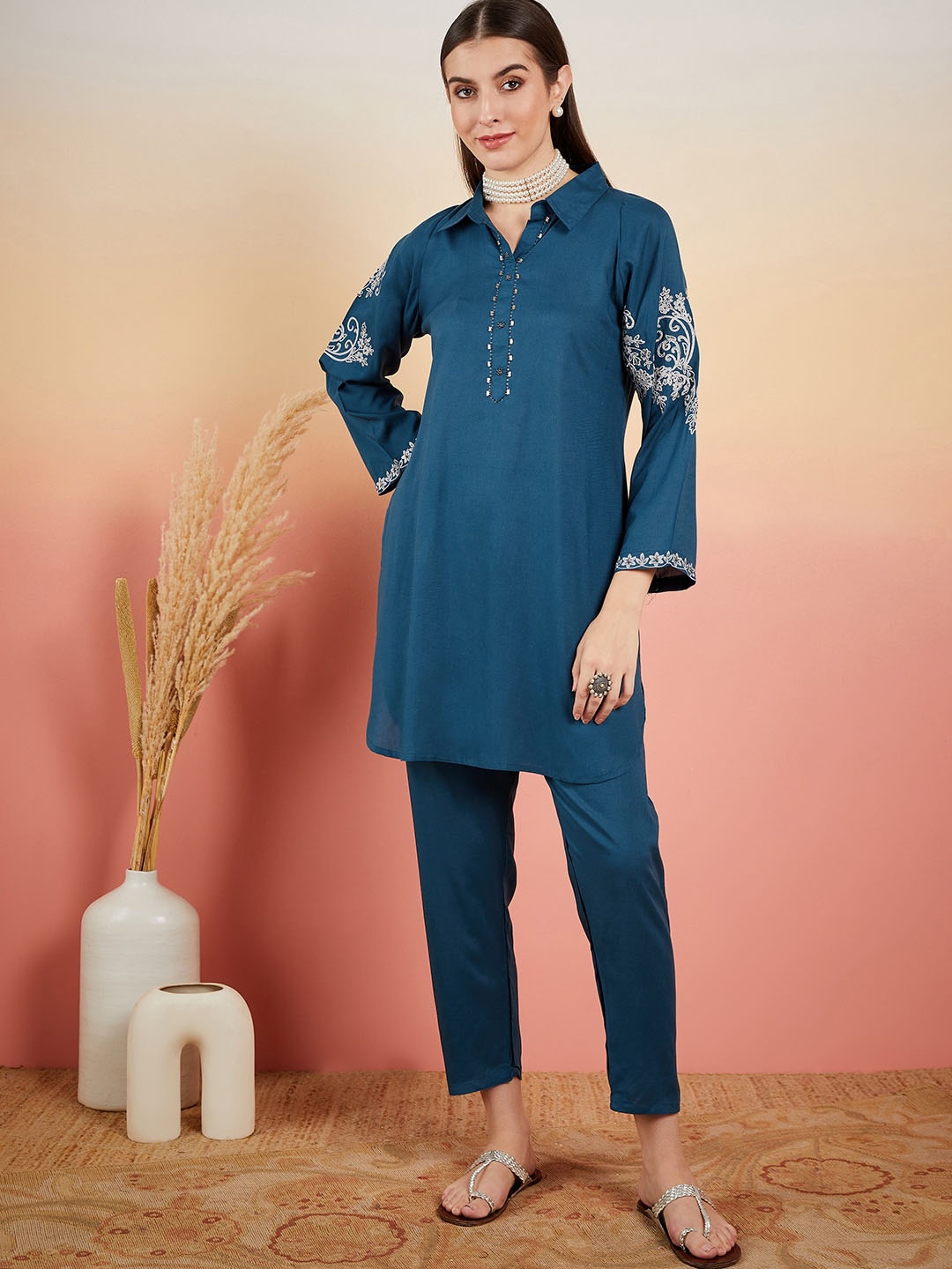 

Vastramyaa Floral Embroidered Shirt Collar Regular Beads& Stones Kurta With Trousers, Teal