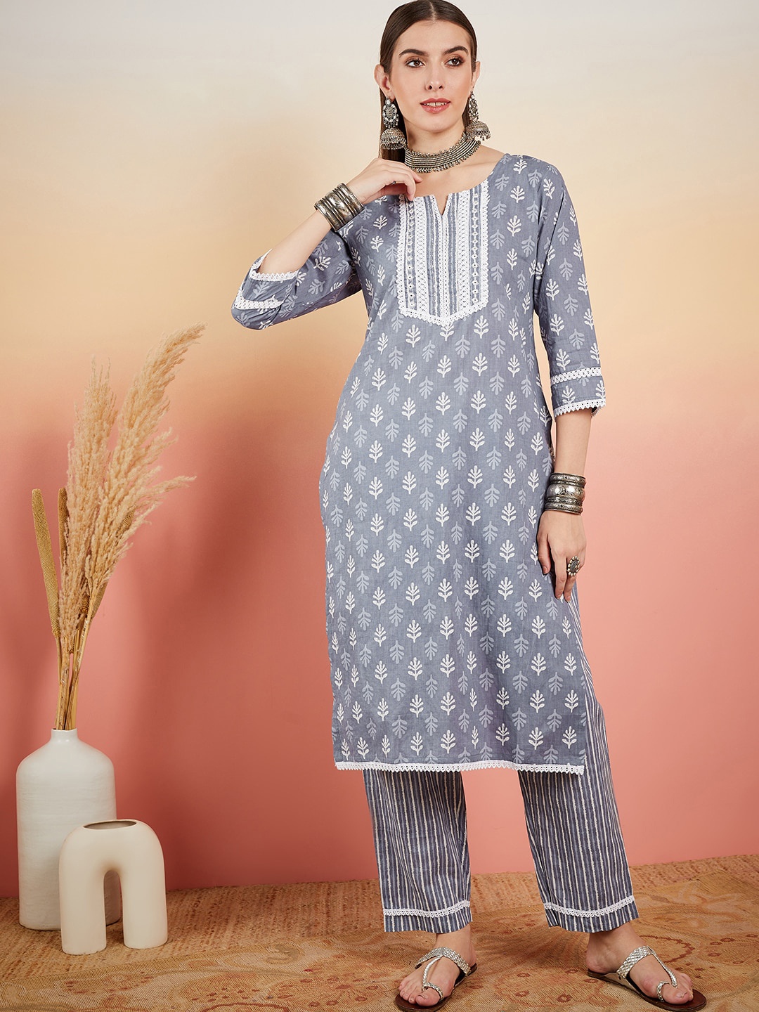 

Vastramyaa Ethnic Motifs Printed Round Neck Pure Cotton Kurta With Trousers, Blue