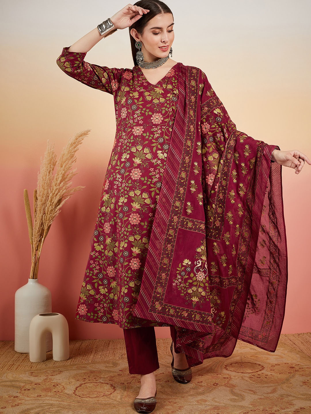 

Vastramyaa Floral Printed V-Neck Regular Pure Cotton Kurta With Trousers & Dupatta, Maroon