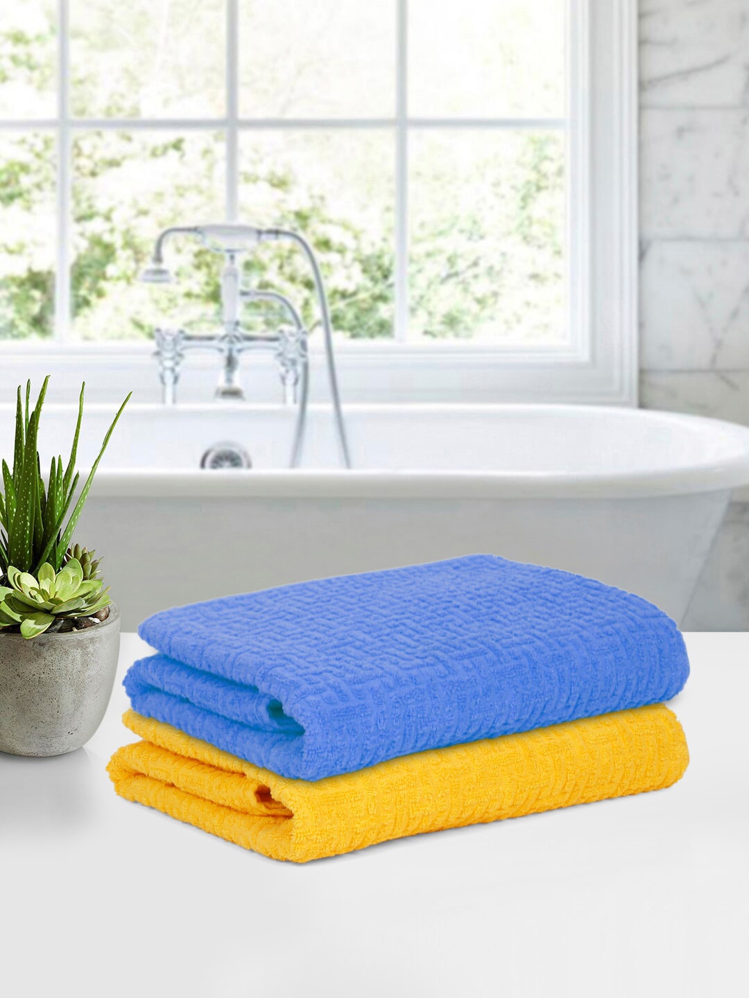 

Cortina Blue & Yellow 2 Pieces Jacquard Super Absorbency 480 GSM Bath Towels