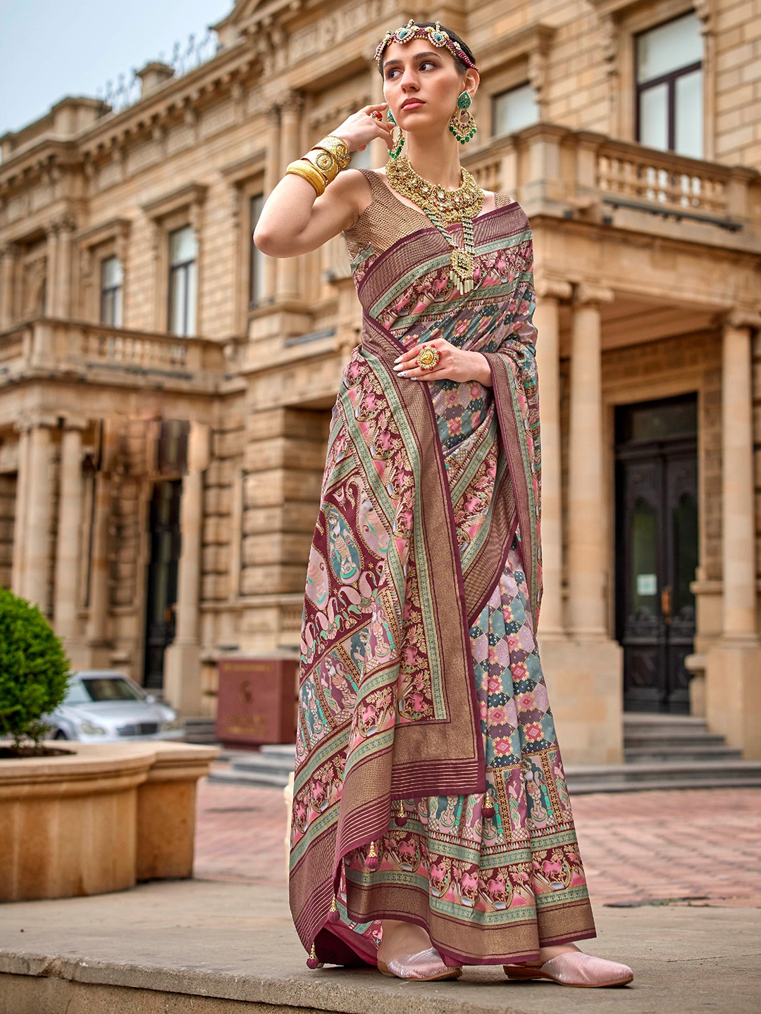 

Mitera Burgundy & Pink Ethnic Motifs Printed Zari Saree