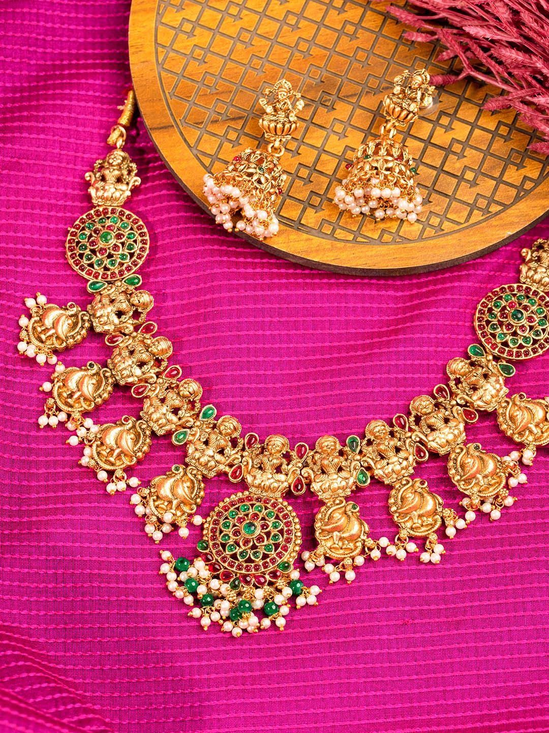 

Priyaasi Gold-Plated Stone Studded & Pearl Beaded Goddess Lakshmi Temple Jewellery Set