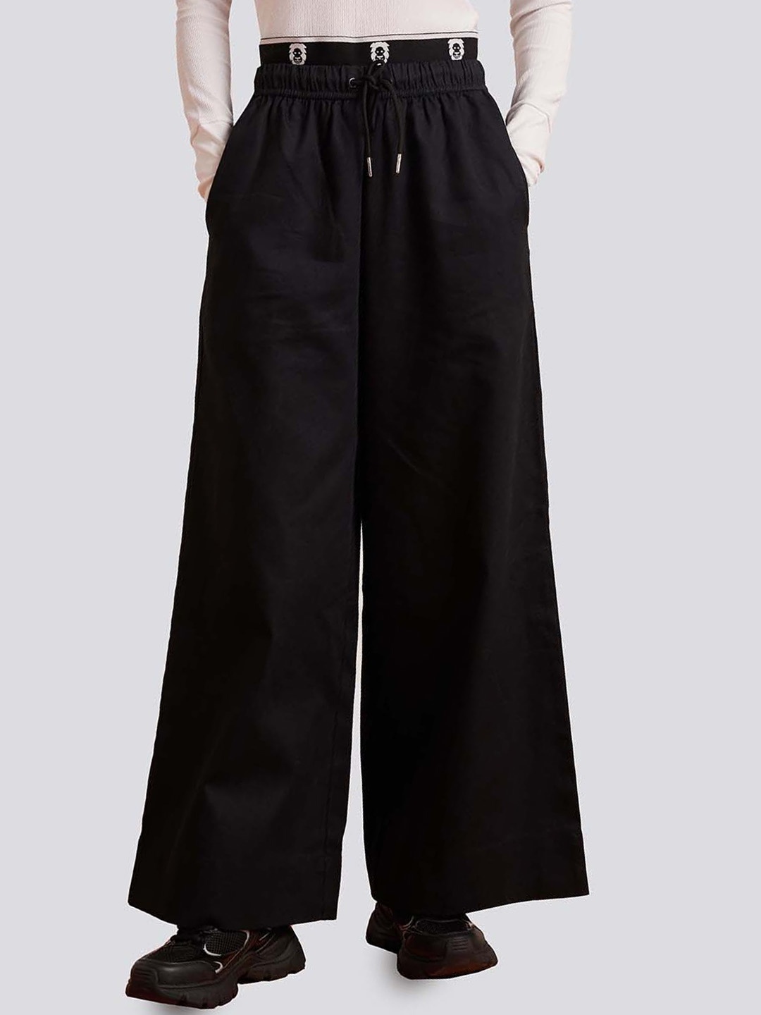 

Muvazo Women Mid Rise Flared Fit Cotton Track Pant, Black