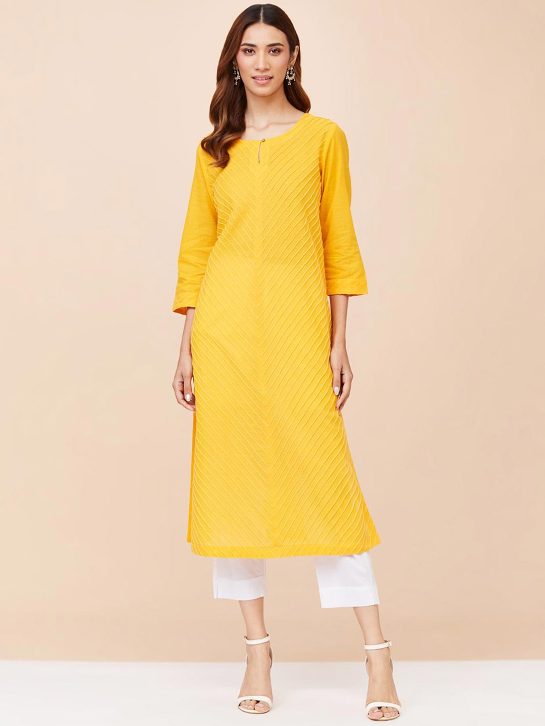 

Fabindia Keyhole Neck Thread Work Cotton Straight Kurta, Yellow